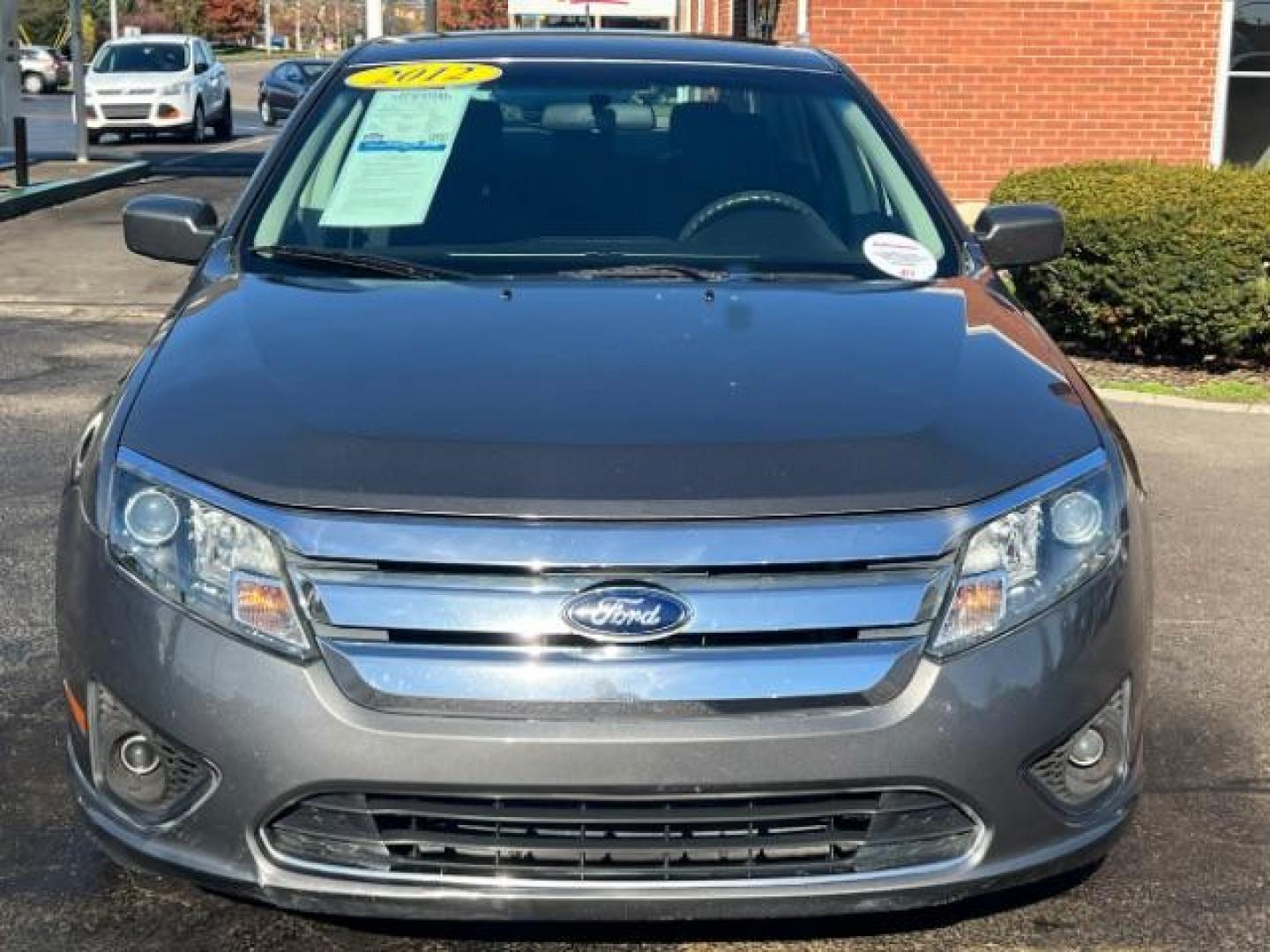 2012 Sterling Gray Metallic Ford Fusion SE (3FAHP0HA5CR) with an 2.5L L4 DOHC 16V engine, located at 880 E. National Road, Vandalia, OH, 45377, (937) 908-9800, 39.892189, -84.181015 - Photo#1