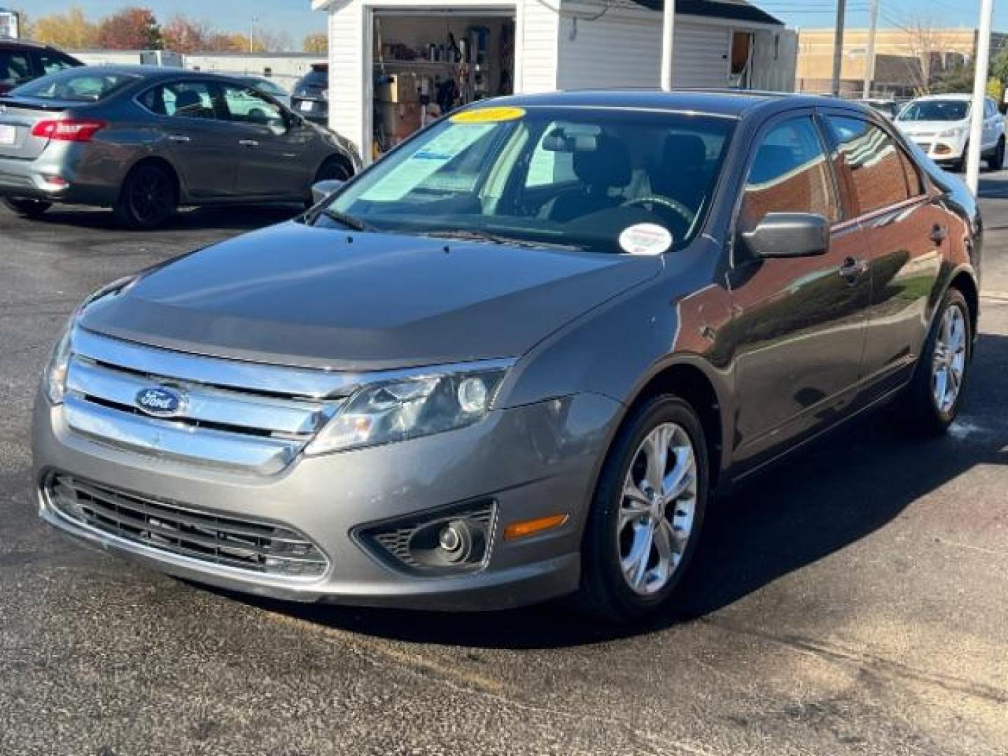 2012 Sterling Gray Metallic Ford Fusion SE (3FAHP0HA5CR) with an 2.5L L4 DOHC 16V engine, located at 880 E. National Road, Vandalia, OH, 45377, (937) 908-9800, 39.892189, -84.181015 - Photo#2