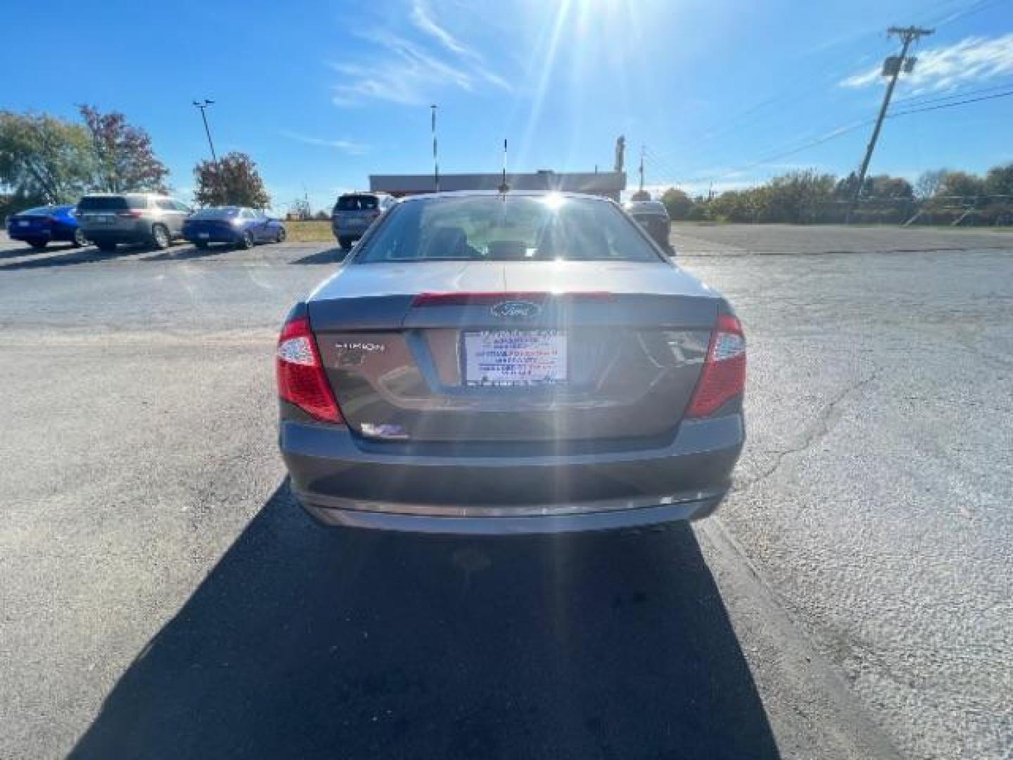 2012 Sterling Gray Metallic Ford Fusion SE (3FAHP0HA5CR) with an 2.5L L4 DOHC 16V engine, located at 880 E. National Road, Vandalia, OH, 45377, (937) 908-9800, 39.892189, -84.181015 - Photo#4