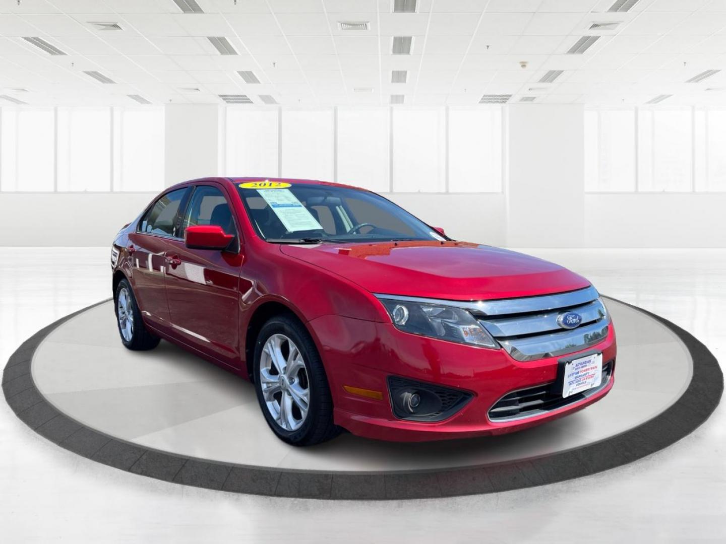 2012 Red Candy Metallic Ford Fusion (3FAHP0HA5CR) with an 2.5L L4 DOHC 16V engine, located at 1951 S Dayton Lakeview Rd., New Carlisle, OH, 45344, (937) 908-9800, 39.890999, -84.050255 - Photo#0