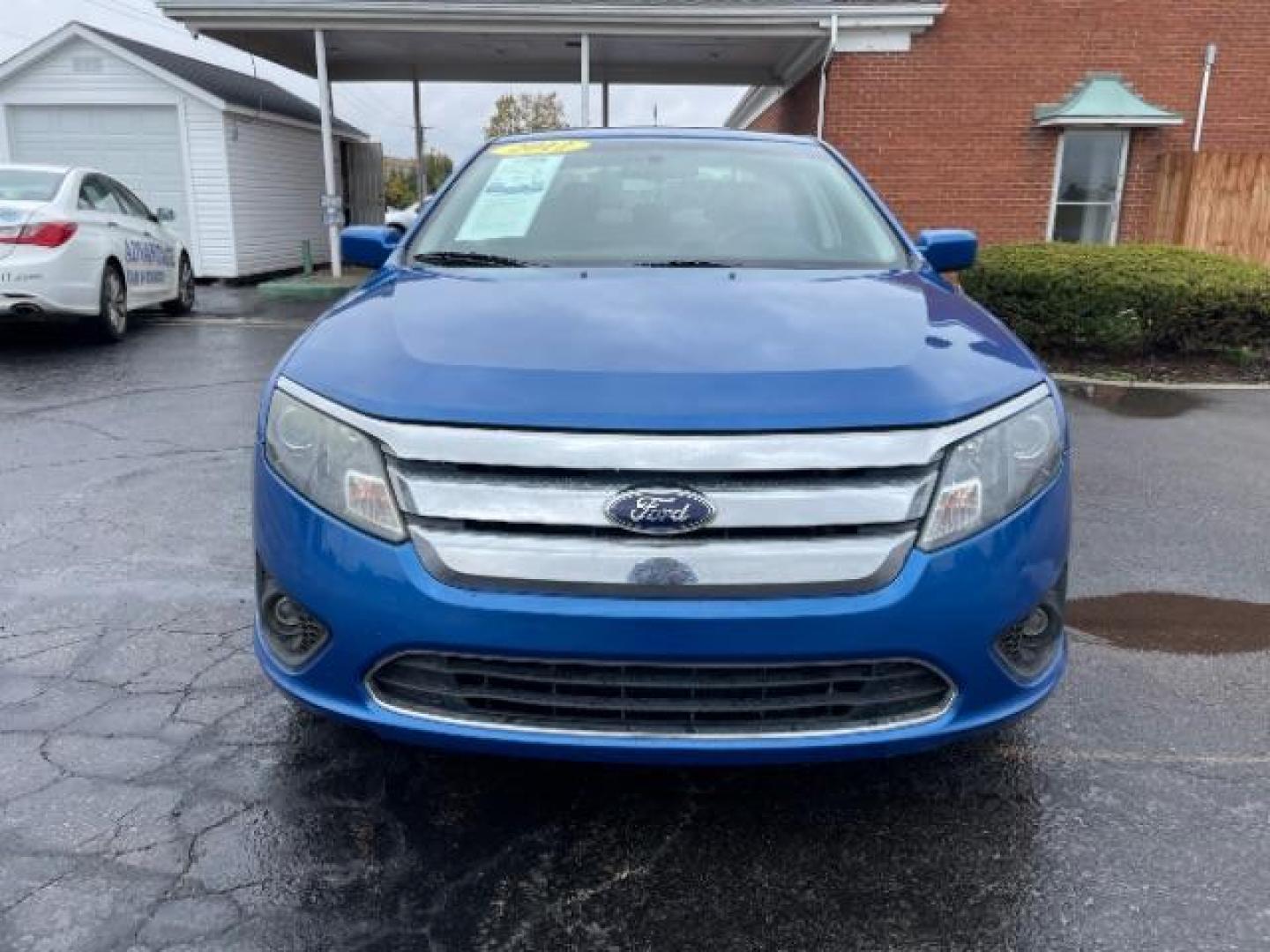 2012 Blue Flame Metallic Ford Fusion SE (3FAHP0HG6CR) with an 3.0L V6 DOHC 24V engine, located at 401 Woodman Dr, Riverside, OH, 45431, (937) 908-9800, 39.763779, -84.122063 - Photo#2