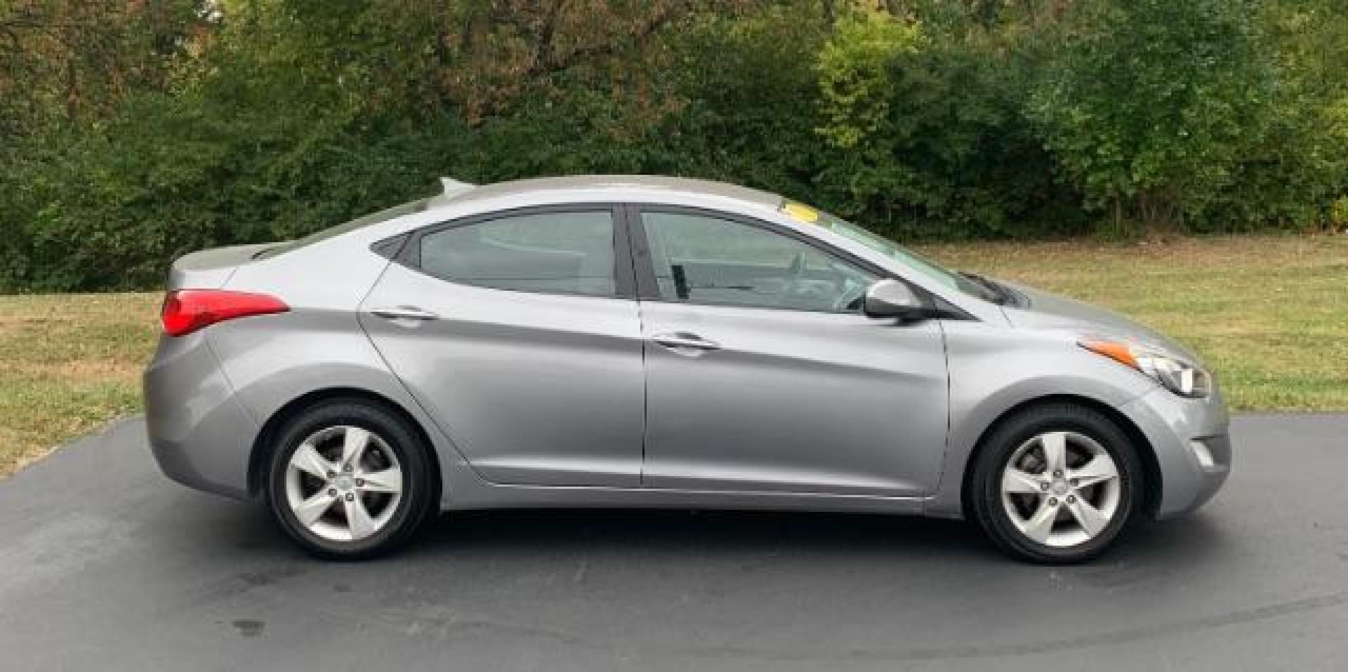 2012 Harbor Gray Metallic Hyundai Elantra GLS A/T (KMHDH4AE3CU) with an 1.8L L4 DOHC 16V engine, 6-Speed Automatic transmission, located at 1184 Kauffman Ave, Fairborn, OH, 45324, (937) 908-9800, 39.807365, -84.029114 - Photo#2