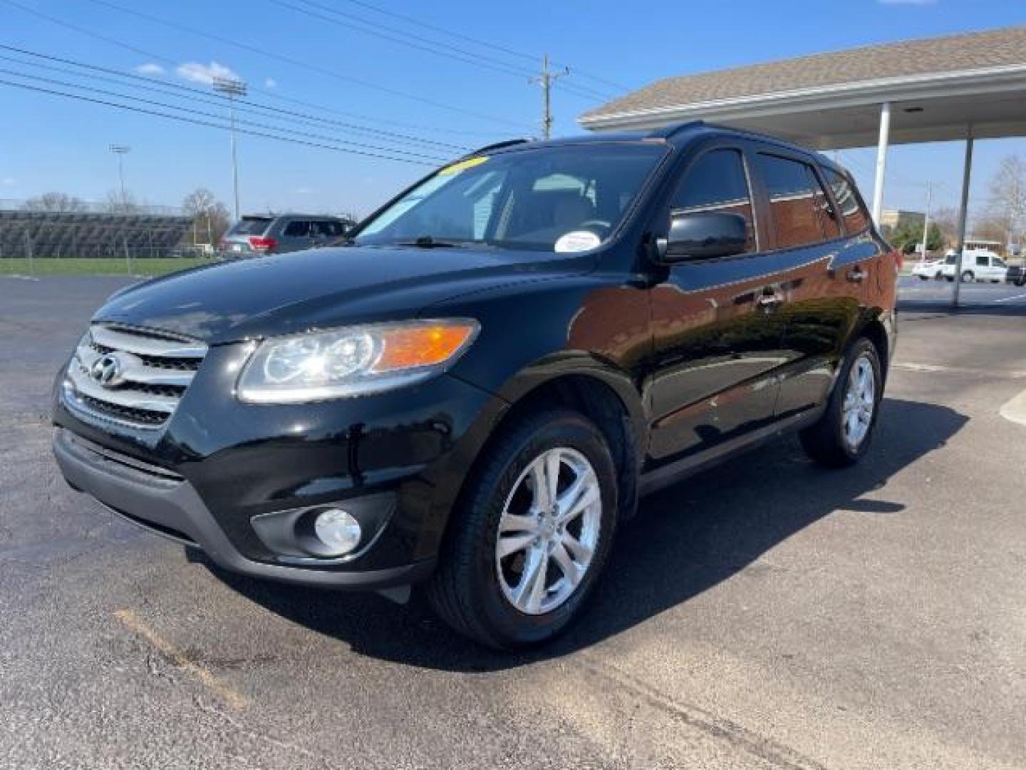 2012 Twilight Black Hyundai Santa Fe Limited 2.4 FWD (5XYZK3AB2CG) with an 2.4L L4 DOHC 16V engine, 6-Speed Automatic transmission, located at 4508 South Dixie Dr, Moraine, OH, 45439, (937) 908-9800, 39.690136, -84.216438 - Photo#1