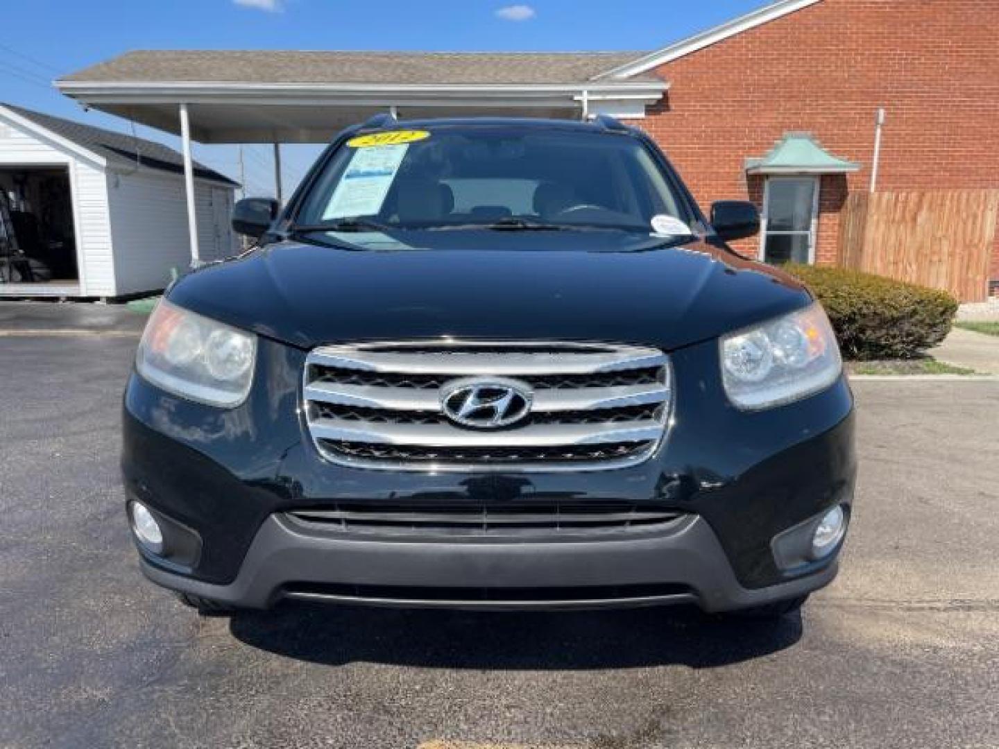 2012 Twilight Black Hyundai Santa Fe Limited 2.4 FWD (5XYZK3AB2CG) with an 2.4L L4 DOHC 16V engine, 6-Speed Automatic transmission, located at 4508 South Dixie Dr, Moraine, OH, 45439, (937) 908-9800, 39.690136, -84.216438 - Photo#4