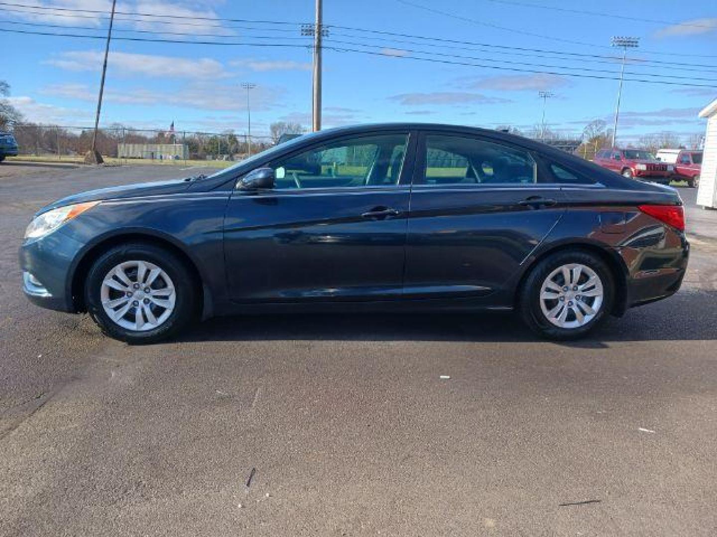 2012 Pacific Blue Pearl Hyundai Sonata GLS Auto (5NPEB4AC6CH) with an 2.4L L4 DOHC 16V engine, 6-Speed Automatic transmission, located at 1099 N County Rd 25A, OH, 45373, (937) 908-9800, 40.057079, -84.212883 - Photo#3