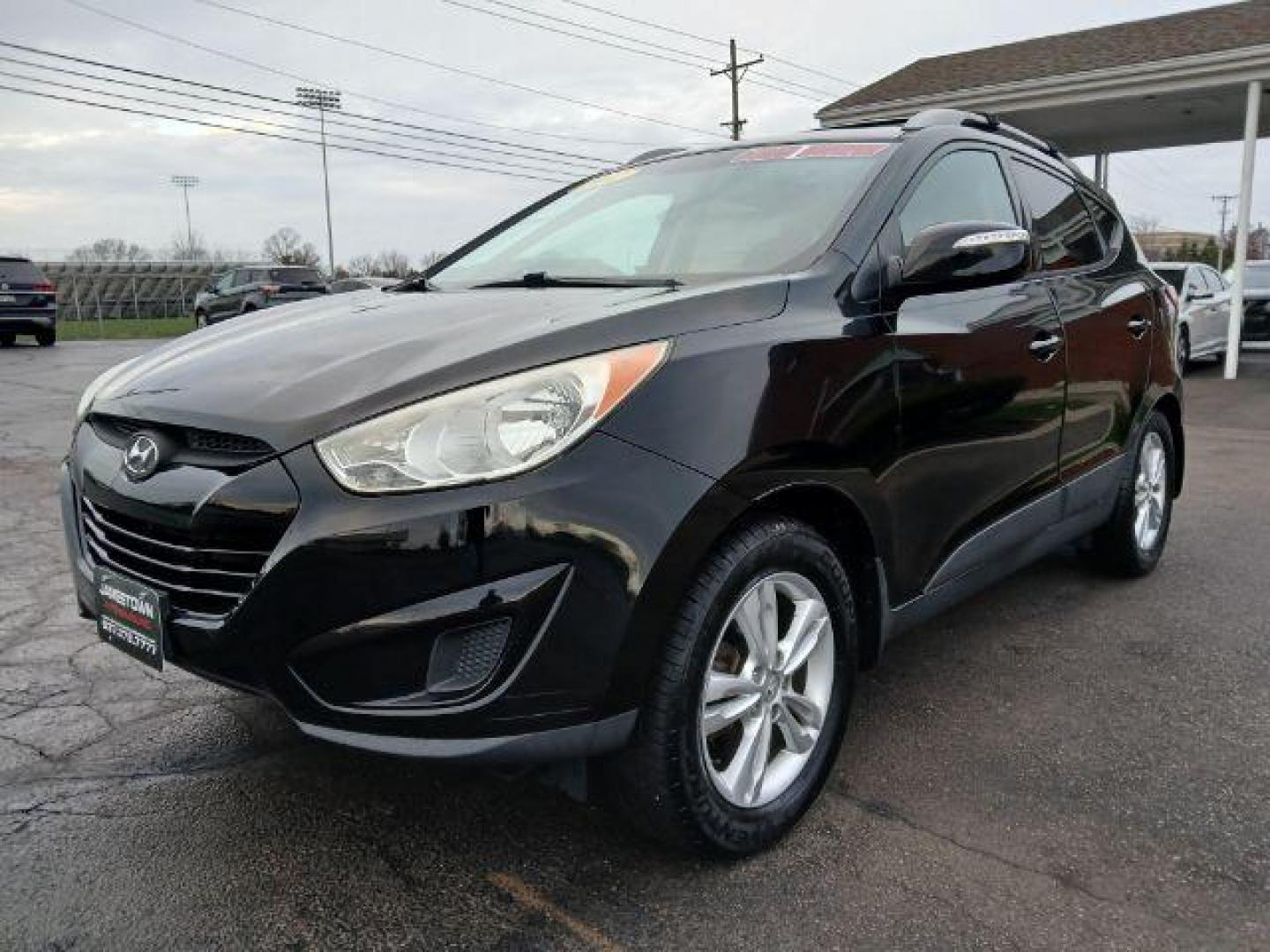 2012 Hyundai Tucson GLS AWD (KM8JUCACXCU) with an 2.4L L4 DOHC 16V engine, 6-Speed Automatic transmission, located at 1951 S Dayton Lakeview Rd., New Carlisle, OH, 45344, (937) 908-9800, 39.890999, -84.050255 - 2012 Hyundai Tucson GLS AWD - Photo#14