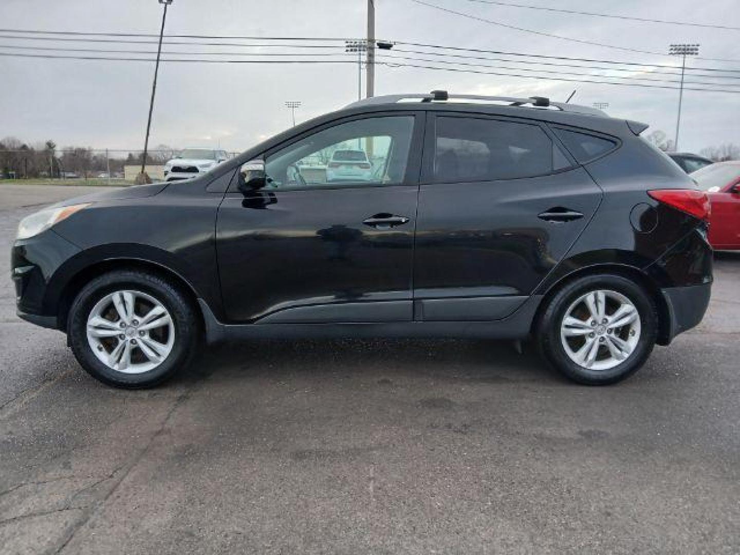 2012 Hyundai Tucson GLS AWD (KM8JUCACXCU) with an 2.4L L4 DOHC 16V engine, 6-Speed Automatic transmission, located at 1951 S Dayton Lakeview Rd., New Carlisle, OH, 45344, (937) 908-9800, 39.890999, -84.050255 - 2012 Hyundai Tucson GLS AWD - Photo#15