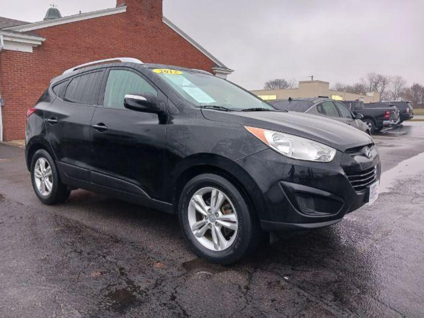 2012 Ash Black Mica Hyundai Tucson GLS AWD (KM8JUCAC9CU) with an 2.4L L4 DOHC 16V engine, 6-Speed Automatic transmission, located at 1230 East Main St, Xenia, OH, 45385, (937) 908-9800, 39.687321, -83.910294 - Photo#0