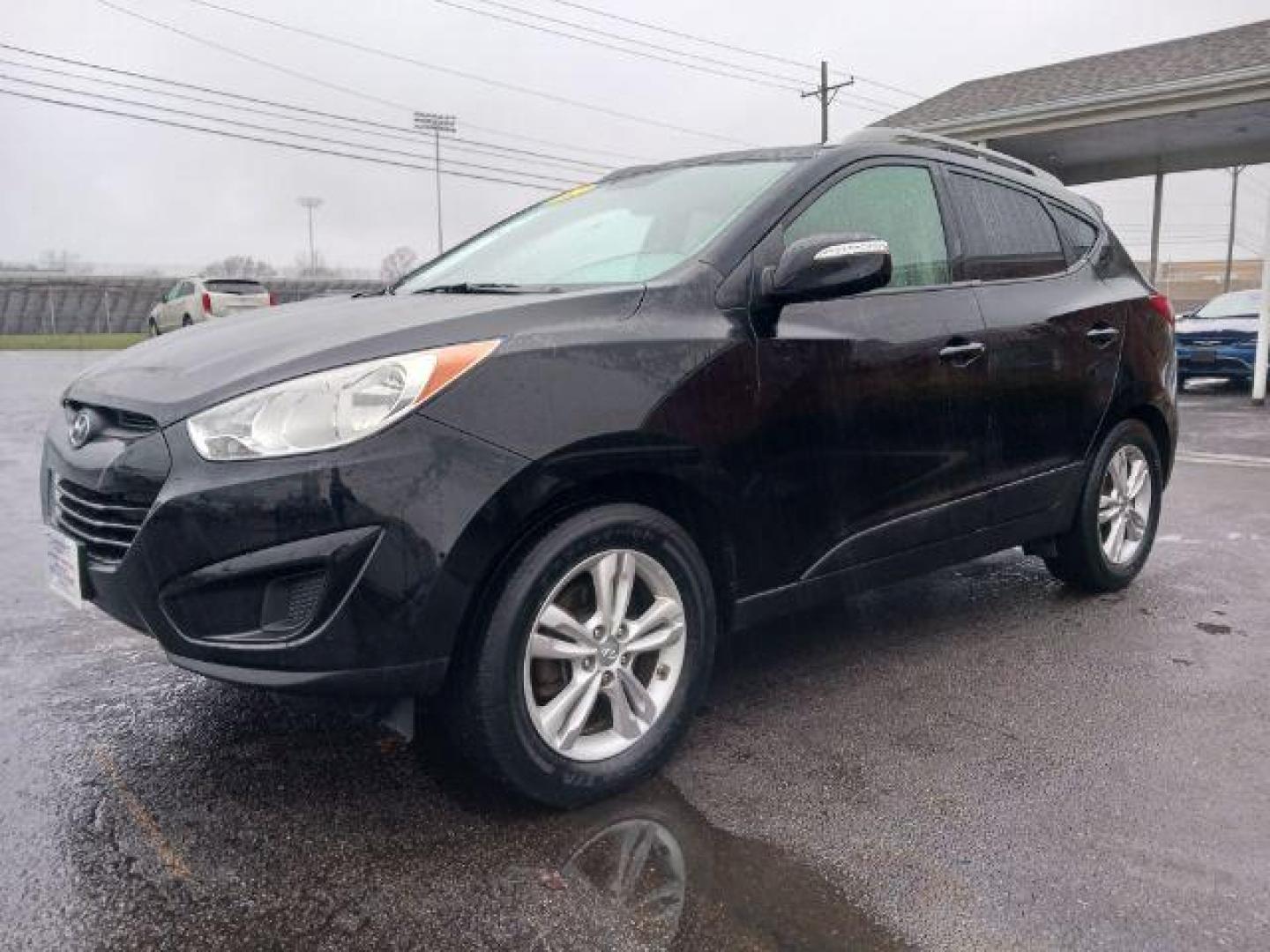 2012 Ash Black Mica Hyundai Tucson GLS AWD (KM8JUCAC9CU) with an 2.4L L4 DOHC 16V engine, 6-Speed Automatic transmission, located at 1230 East Main St, Xenia, OH, 45385, (937) 908-9800, 39.687321, -83.910294 - Photo#2