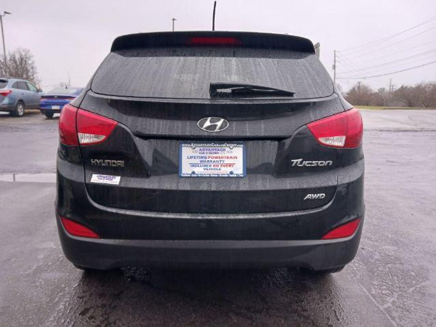 2012 Ash Black Mica Hyundai Tucson GLS AWD (KM8JUCAC9CU) with an 2.4L L4 DOHC 16V engine, 6-Speed Automatic transmission, located at 1230 East Main St, Xenia, OH, 45385, (937) 908-9800, 39.687321, -83.910294 - Photo#5