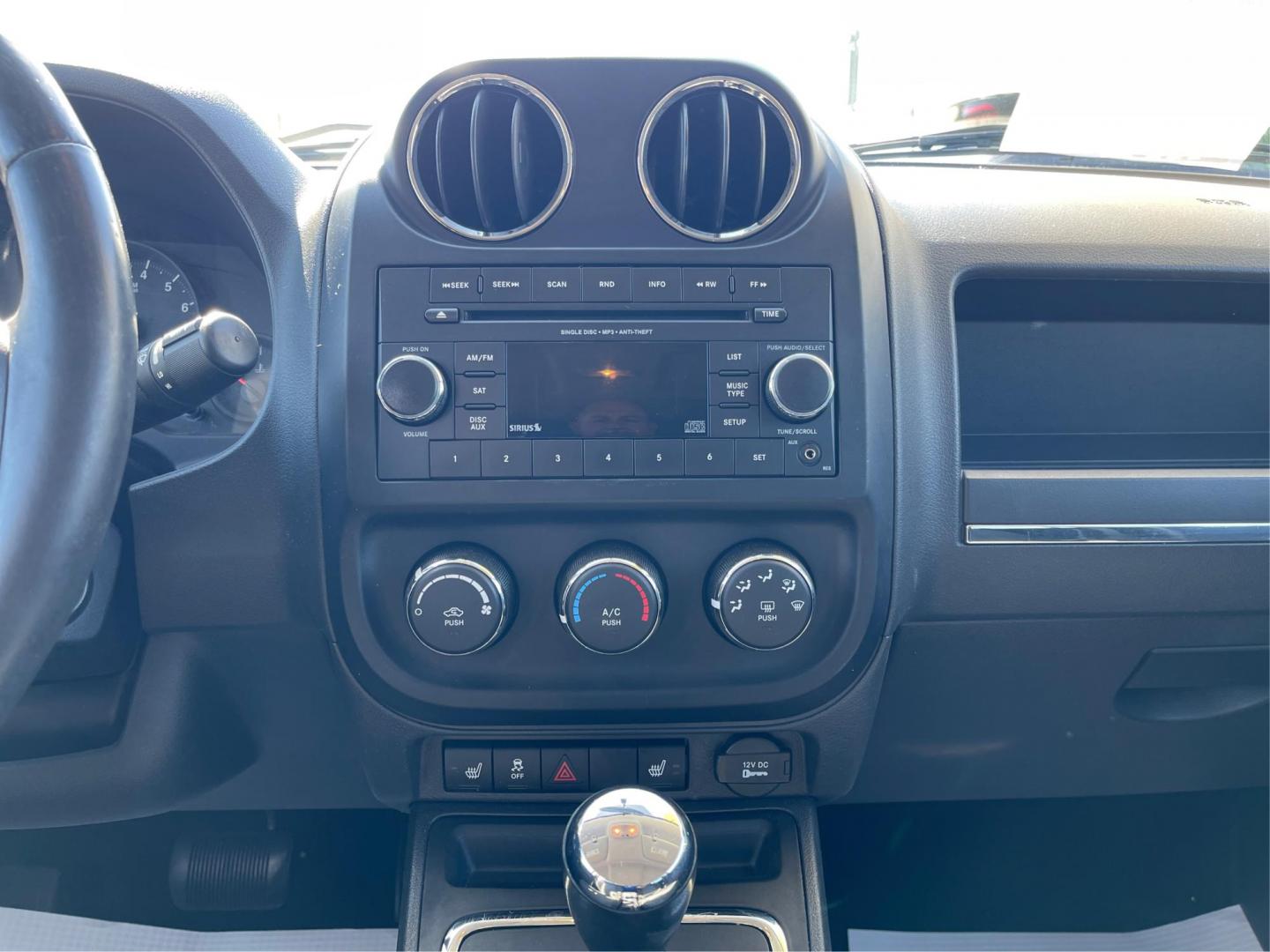 2012 Bright Silver Metallic Jeep Compass Latitude FWD (1C4NJCEB1CD) with an 2.4L L4 DOHC 16V engine, Continuously Variable Transmission transmission, located at 880 E. National Road, Vandalia, OH, 45377, (937) 908-9800, 39.892189, -84.181015 - Photo#12