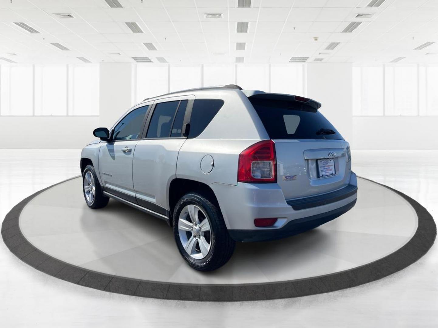 2012 Bright Silver Metallic Jeep Compass Latitude FWD (1C4NJCEB1CD) with an 2.4L L4 DOHC 16V engine, Continuously Variable Transmission transmission, located at 880 E. National Road, Vandalia, OH, 45377, (937) 908-9800, 39.892189, -84.181015 - Photo#4