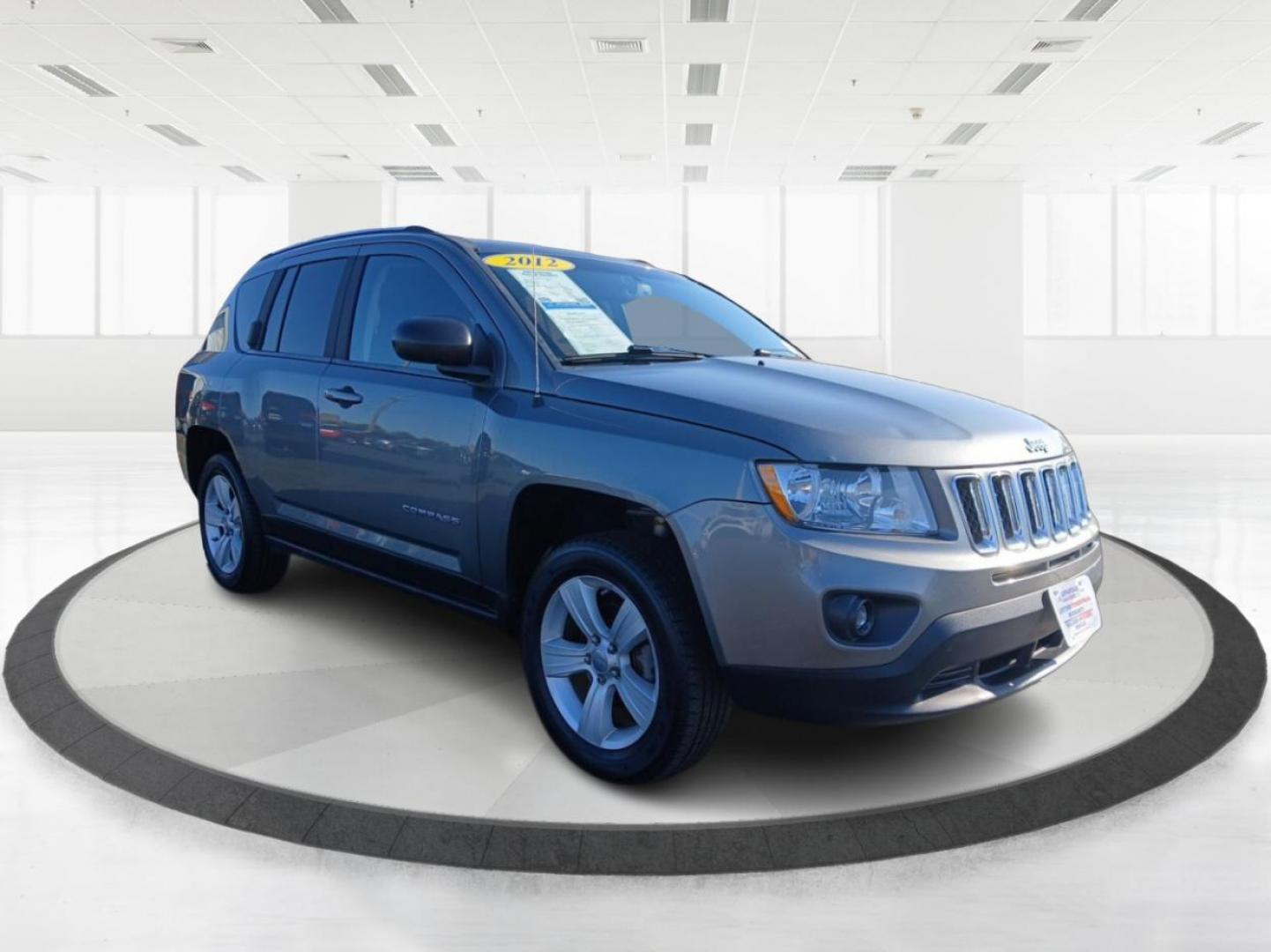 2012 Mineral Gray Metallic Jeep Compass Sport 4WD (1C4NJDBB6CD) with an 2.4L L4 DOHC 16V engine, located at 1099 N County Rd 25A, OH, 45373, (937) 908-9800, 40.057079, -84.212883 - Photo#0