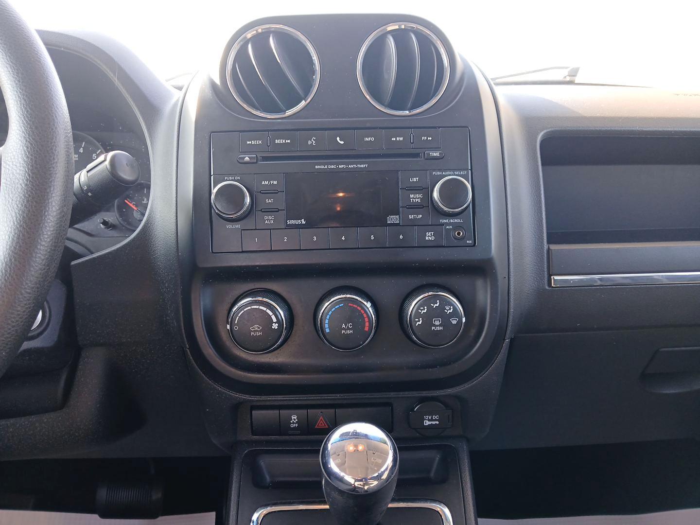 2012 Mineral Gray Metallic Jeep Compass Sport 4WD (1C4NJDBB6CD) with an 2.4L L4 DOHC 16V engine, located at 1099 N County Rd 25A, OH, 45373, (937) 908-9800, 40.057079, -84.212883 - Photo#12