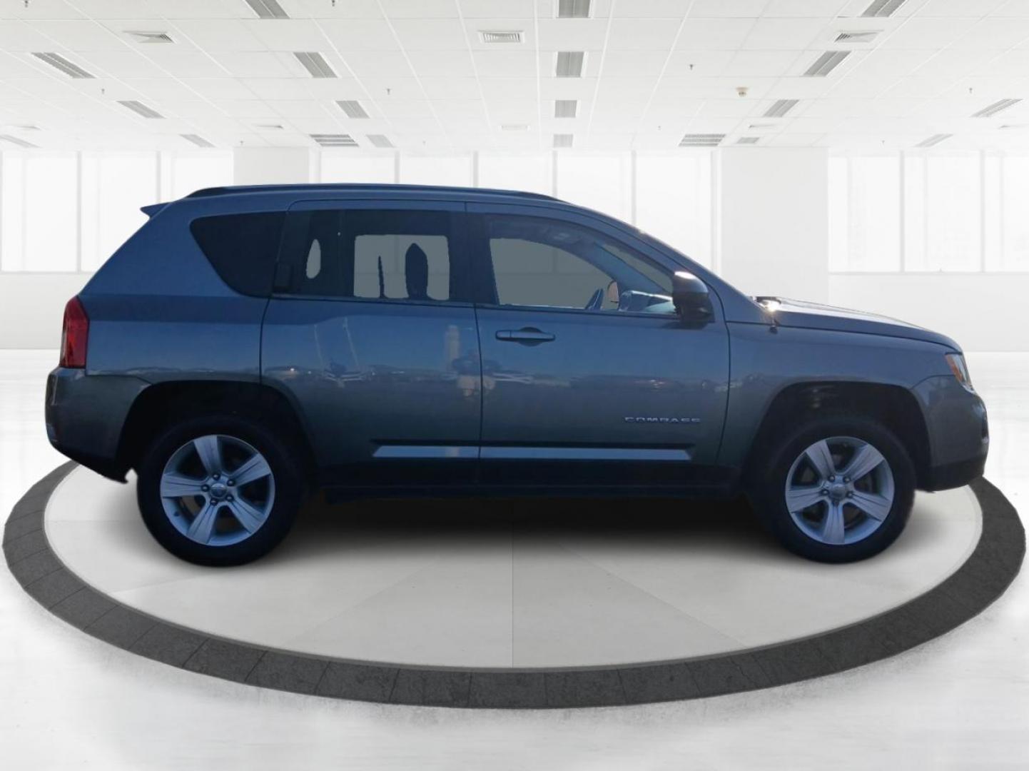 2012 Mineral Gray Metallic Jeep Compass Sport 4WD (1C4NJDBB6CD) with an 2.4L L4 DOHC 16V engine, located at 1099 N County Rd 25A, OH, 45373, (937) 908-9800, 40.057079, -84.212883 - Photo#1