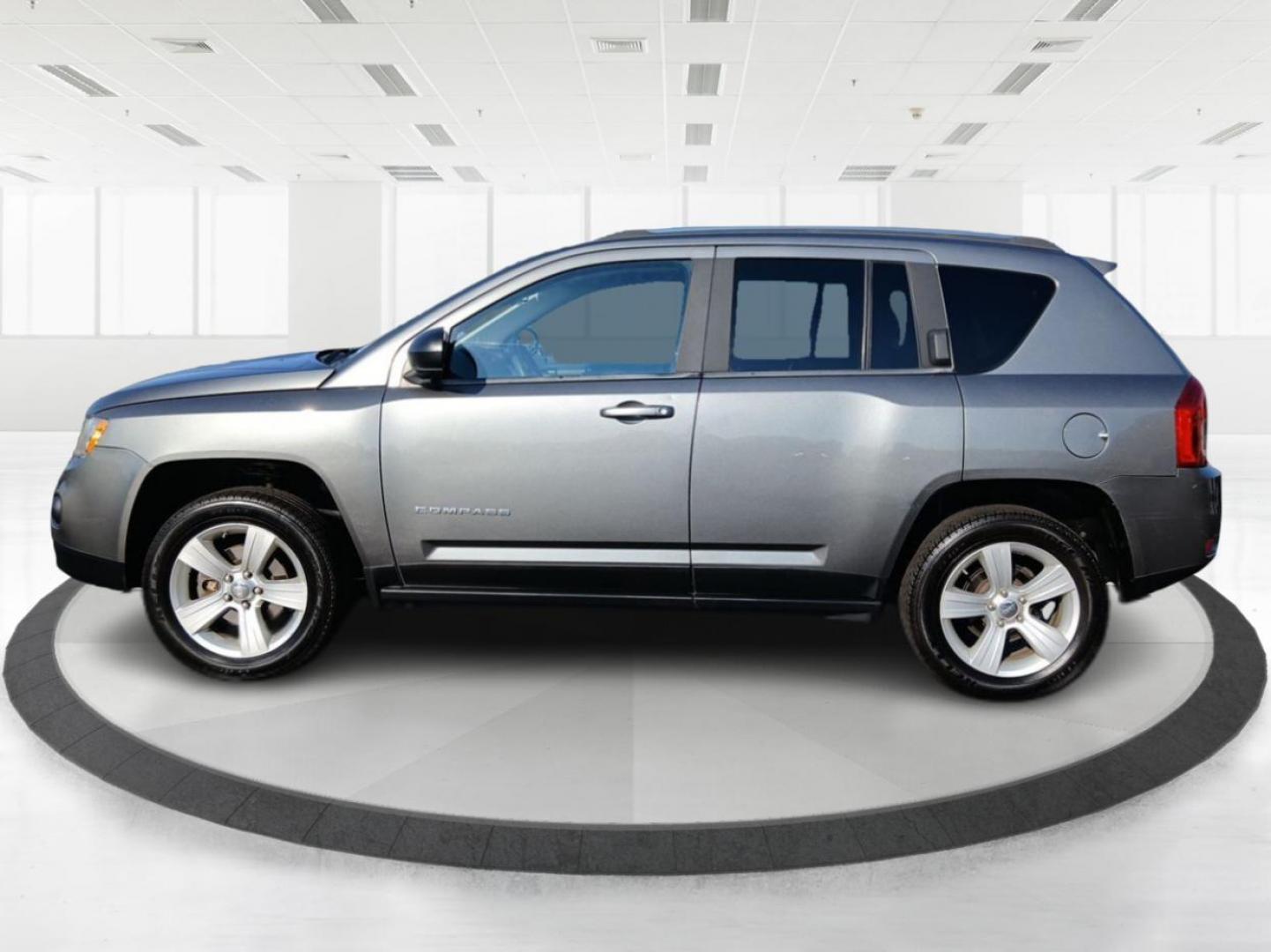 2012 Mineral Gray Metallic Jeep Compass Sport 4WD (1C4NJDBB6CD) with an 2.4L L4 DOHC 16V engine, located at 1099 N County Rd 25A, OH, 45373, (937) 908-9800, 40.057079, -84.212883 - Photo#5