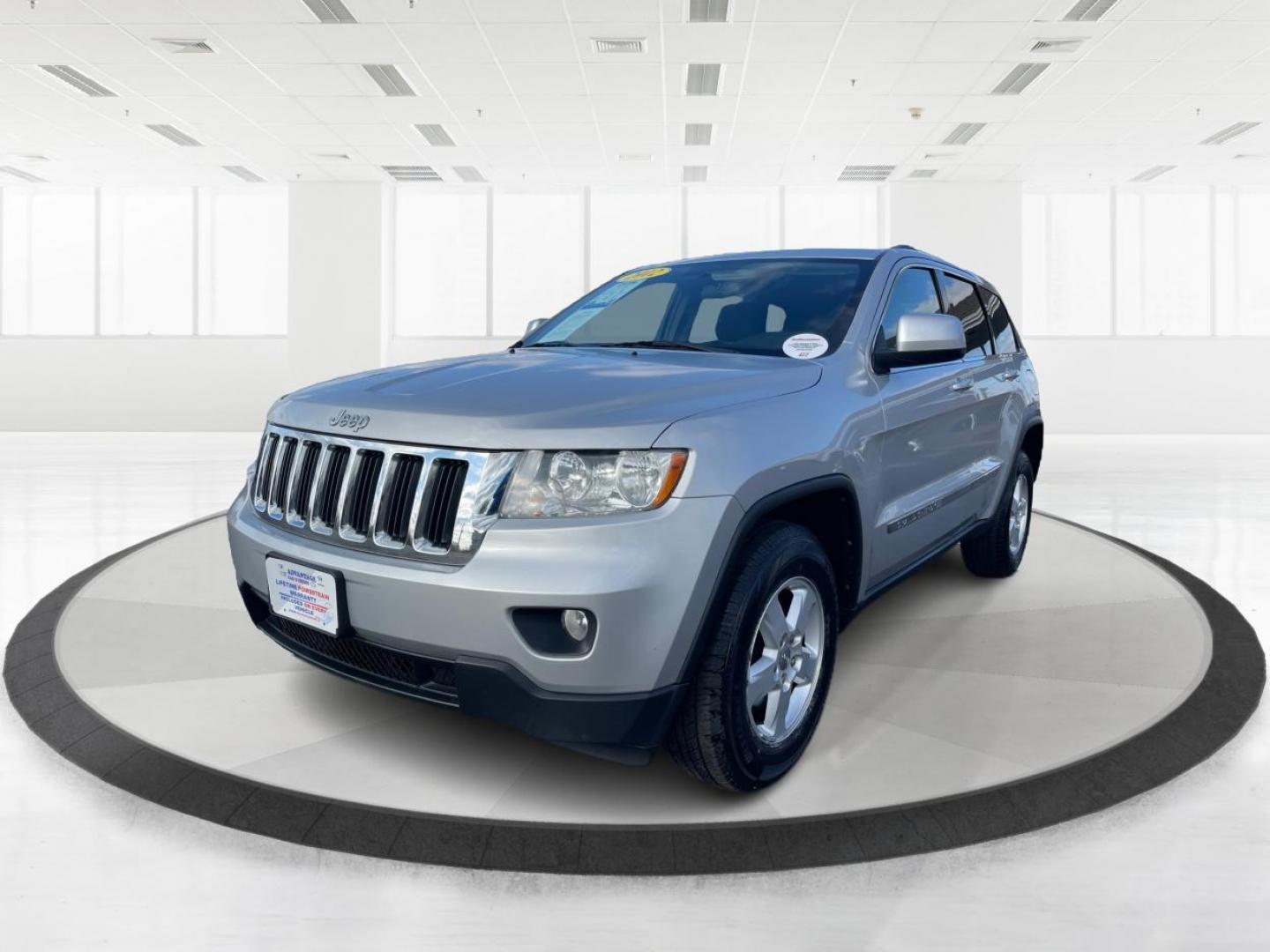 2012 Jeep Grand Cherokee Laredo 4WD (1C4RJFAG2CC) with an 3.6L V6 DOHC 24V engine, 5-Speed Automatic transmission, located at 8750 N County Rd 25A, Piqua, OH, 45356, (937) 908-9800, 40.164391, -84.232513 - 2012 Jeep Grand Cherokee Laredo 4WD - Photo#7