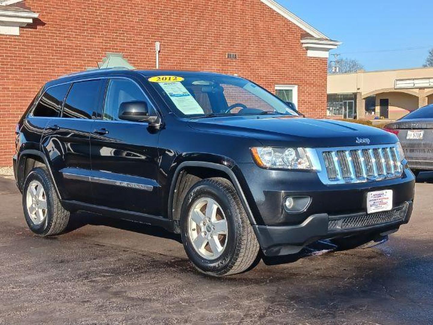 2012 Brilliant Black Crystal Pearl Jeep Grand Cherokee Laredo 4WD (1C4RJFAG1CC) with an 3.6L V6 DOHC 24V engine, 5-Speed Automatic transmission, located at 1184 Kauffman Ave, Fairborn, OH, 45324, (937) 908-9800, 39.807365, -84.029114 - Photo#0