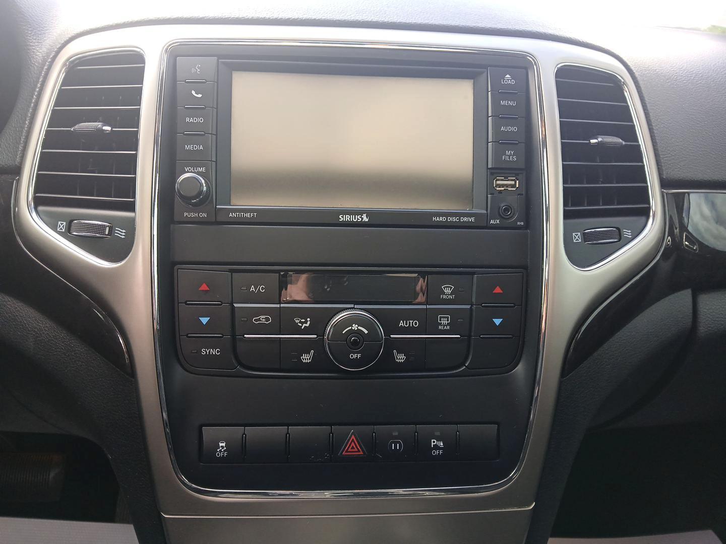 2012 Brilliant Black Crystal Pearl Jeep Grand Cherokee (1C4RJFAG1CC) with an 3.6L V6 DOHC 24V engine, 5-Speed Automatic transmission, located at 1230 East Main St, Xenia, OH, 45385, (937) 908-9800, 39.687321, -83.910294 - Photo#12