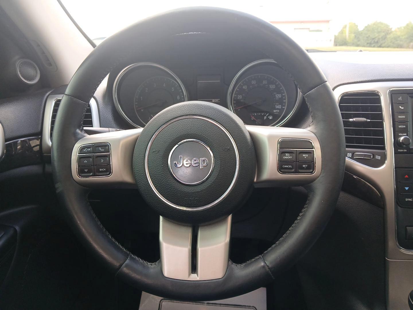 2012 Brilliant Black Crystal Pearl Jeep Grand Cherokee (1C4RJFAG1CC) with an 3.6L V6 DOHC 24V engine, 5-Speed Automatic transmission, located at 1230 East Main St, Xenia, OH, 45385, (937) 908-9800, 39.687321, -83.910294 - Photo#15