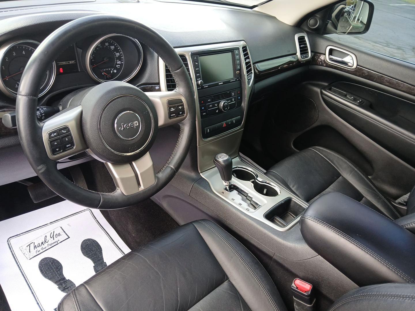 2012 Brilliant Black Crystal Pearl Jeep Grand Cherokee (1C4RJFAG1CC) with an 3.6L V6 DOHC 24V engine, 5-Speed Automatic transmission, located at 1230 East Main St, Xenia, OH, 45385, (937) 908-9800, 39.687321, -83.910294 - Photo#8