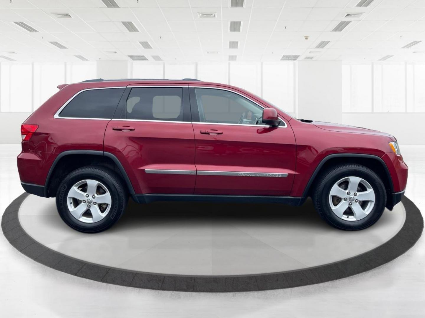 2012 Deep Cherry Red Crystal Pearl Jeep Grand Cherokee Laredo 4WD (1C4RJFAG6CC) with an 3.6L V6 DOHC 24V engine, 5-Speed Automatic transmission, located at 1230 East Main St, Xenia, OH, 45385, (937) 908-9800, 39.687321, -83.910294 - Photo#1