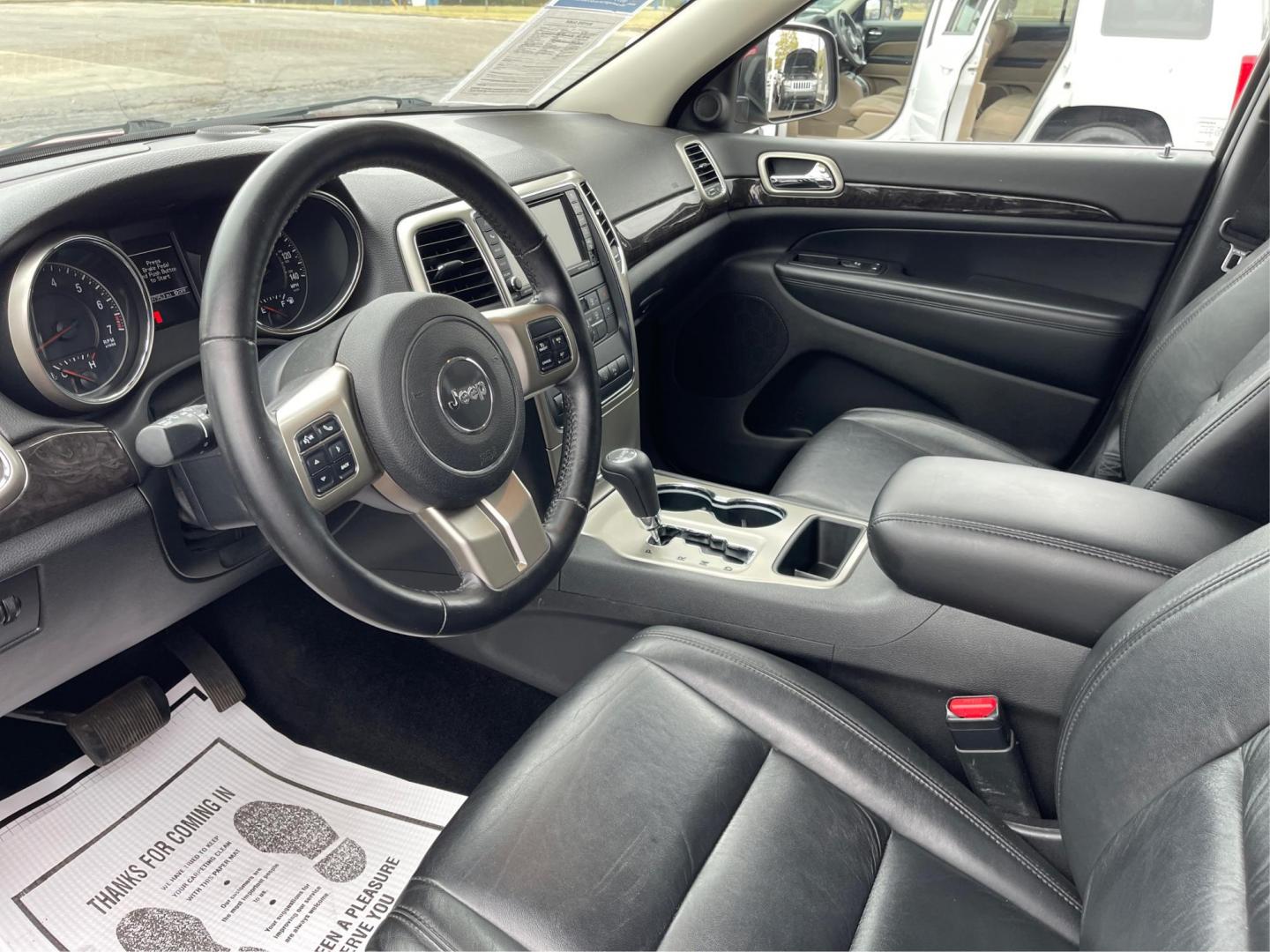 2012 Deep Cherry Red Crystal Pearl Jeep Grand Cherokee Laredo 4WD (1C4RJFAG6CC) with an 3.6L V6 DOHC 24V engine, 5-Speed Automatic transmission, located at 1230 East Main St, Xenia, OH, 45385, (937) 908-9800, 39.687321, -83.910294 - Photo#8