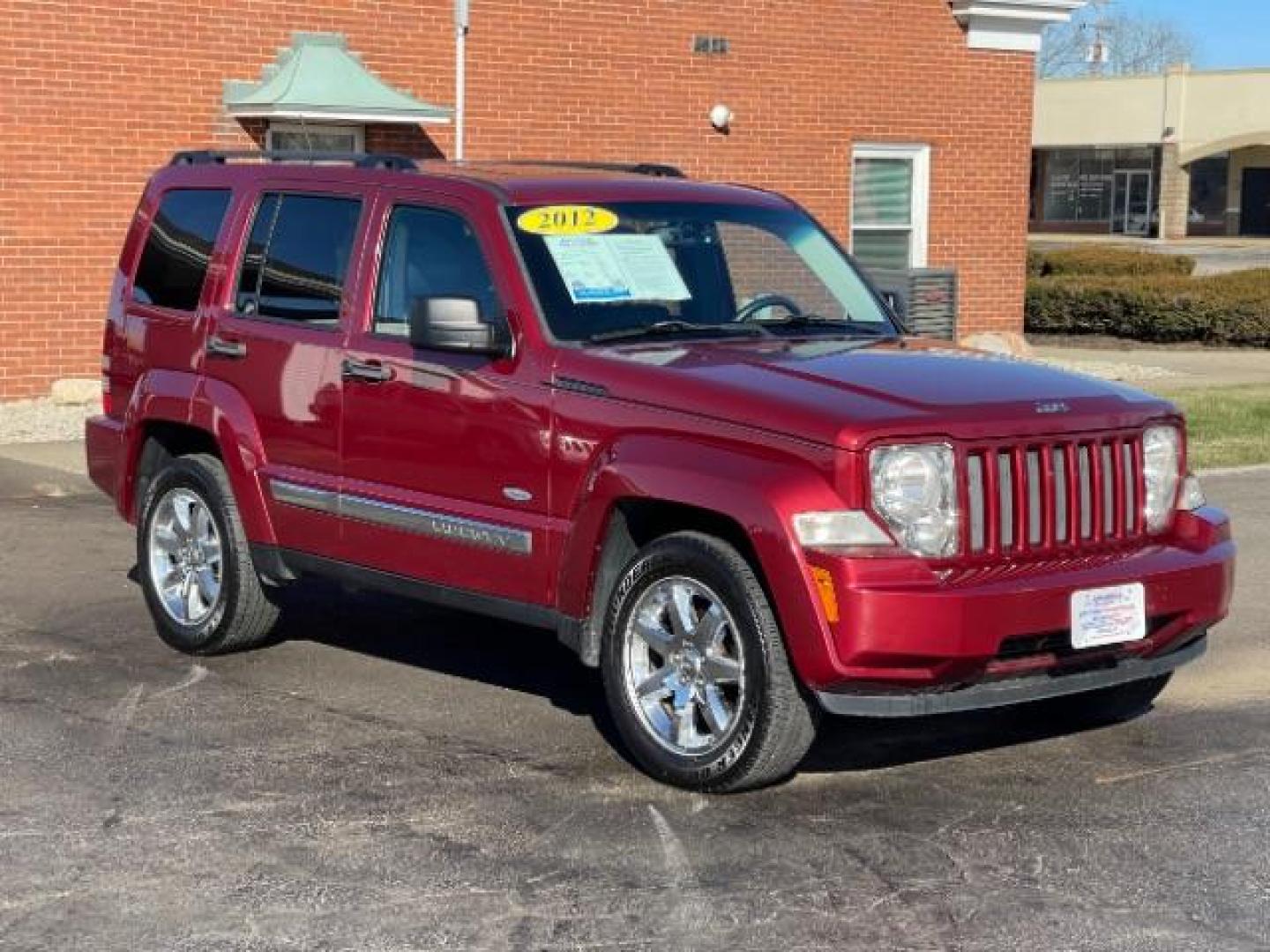 2012 Deep Cherry Red Crystal Pearl Jeep Liberty Sport 4WD (1C4PJMAK3CW) with an 3.7L V6 SOHC 12V engine, 4-Speed Automatic transmission, located at 880 E. National Road, Vandalia, OH, 45377, (937) 908-9800, 39.892189, -84.181015 - Photo#0