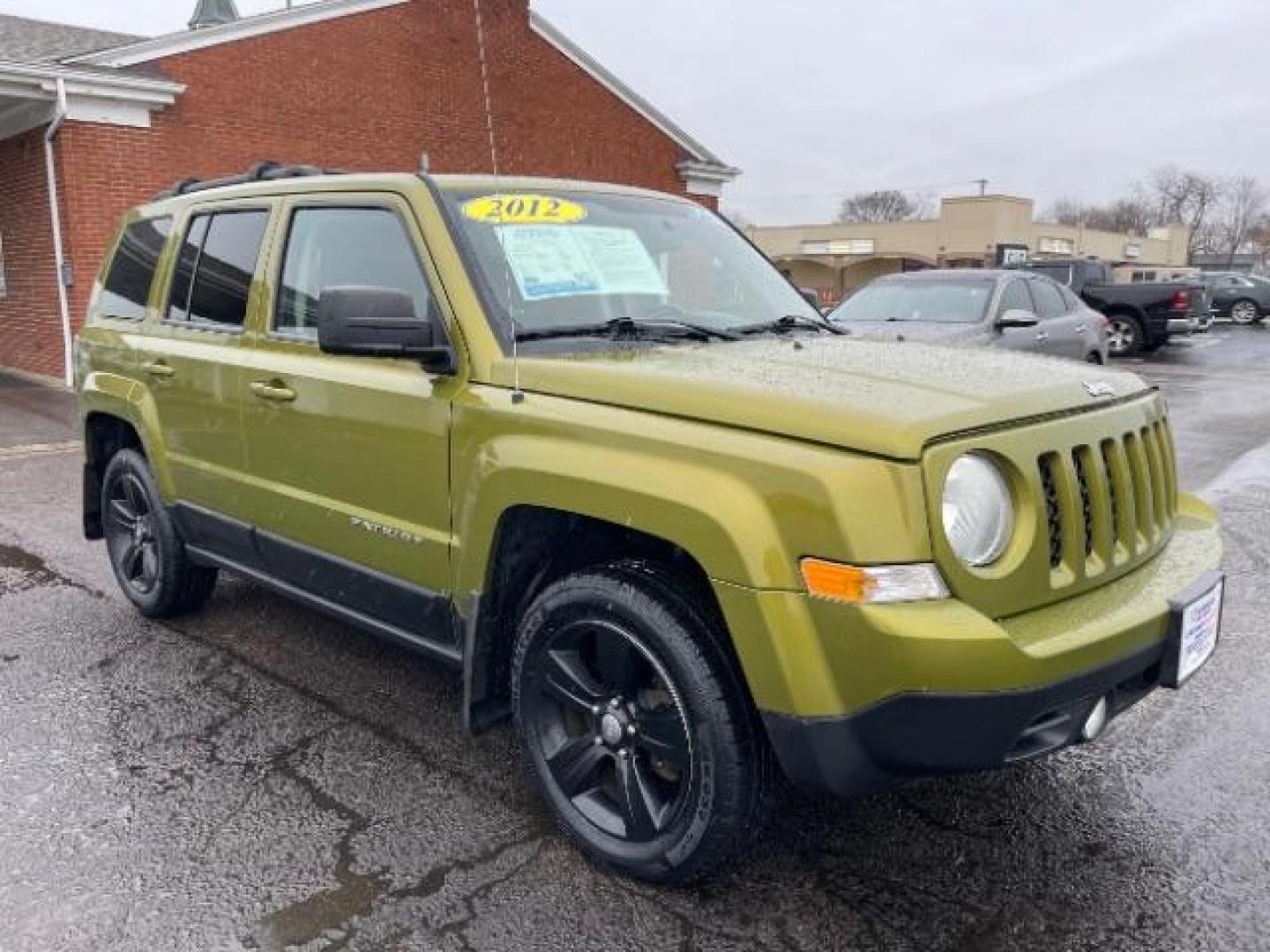 2012 Rescue Green Metallic Jeep Patriot Latitude 4WD (1C4NJRFB8CD) with an 2.4L L4 DOHC 16V engine, located at 1099 N County Rd 25A, OH, 45373, (937) 908-9800, 40.057079, -84.212883 - Photo#0