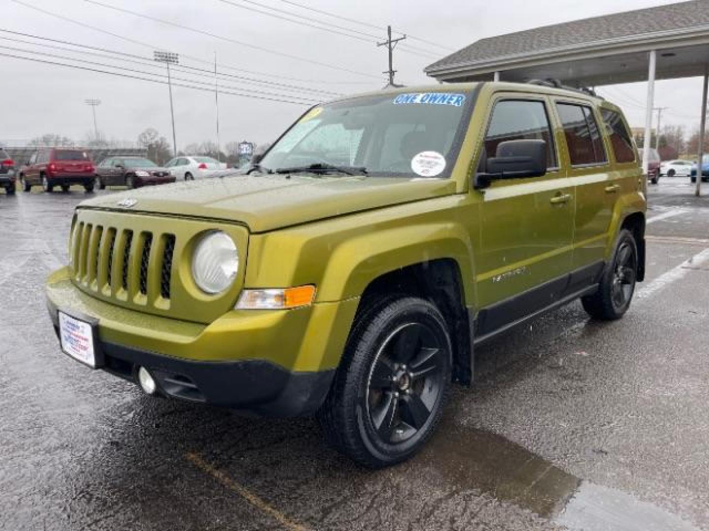 2012 Rescue Green Metallic Jeep Patriot Latitude 4WD (1C4NJRFB8CD) with an 2.4L L4 DOHC 16V engine, located at 1099 N County Rd 25A, OH, 45373, (937) 908-9800, 40.057079, -84.212883 - Photo#1