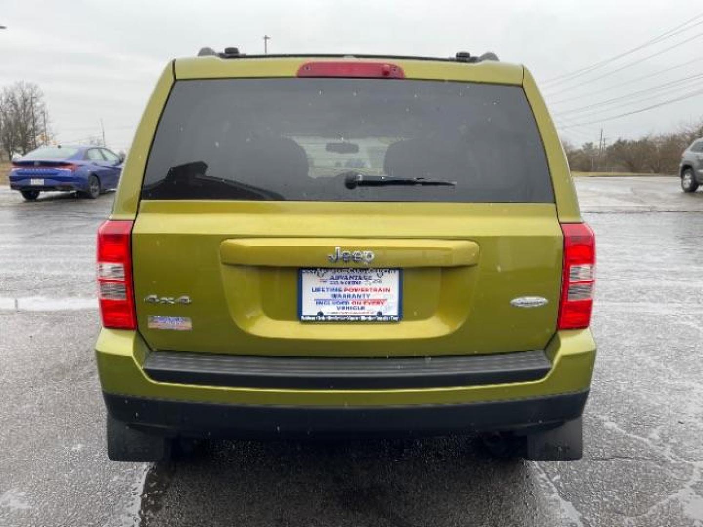 2012 Rescue Green Metallic Jeep Patriot Latitude 4WD (1C4NJRFB8CD) with an 2.4L L4 DOHC 16V engine, located at 1099 N County Rd 25A, OH, 45373, (937) 908-9800, 40.057079, -84.212883 - Photo#4