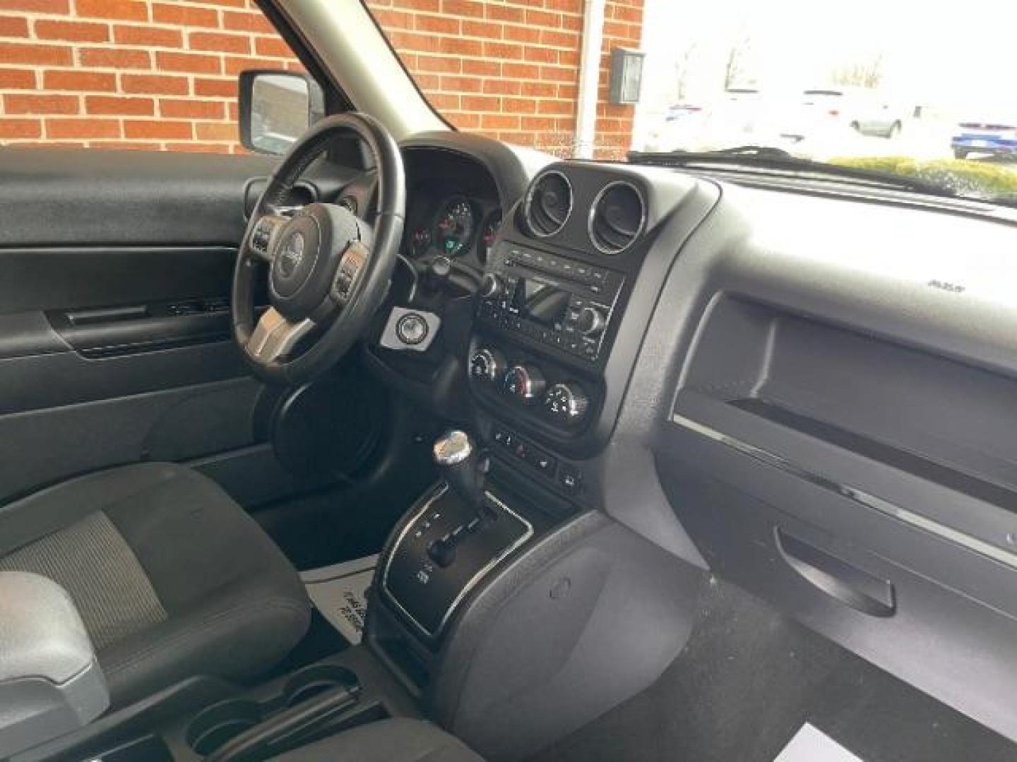 2012 Rescue Green Metallic Jeep Patriot Latitude 4WD (1C4NJRFB8CD) with an 2.4L L4 DOHC 16V engine, located at 1099 N County Rd 25A, OH, 45373, (937) 908-9800, 40.057079, -84.212883 - Photo#6