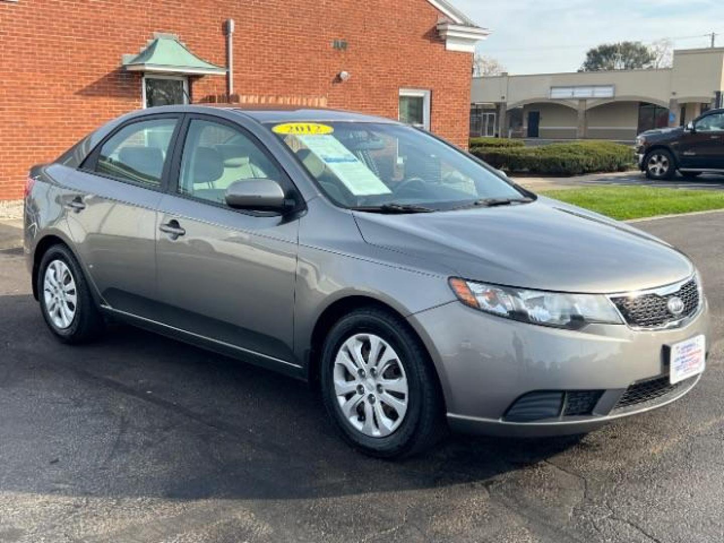 2012 Metal Bronze Metallic Kia Forte EX (KNAFU4A24C5) with an 2.0L L4 DOHC 16V engine, located at 1184 Kauffman Ave, Fairborn, OH, 45324, (937) 908-9800, 39.807365, -84.029114 - Photo#0