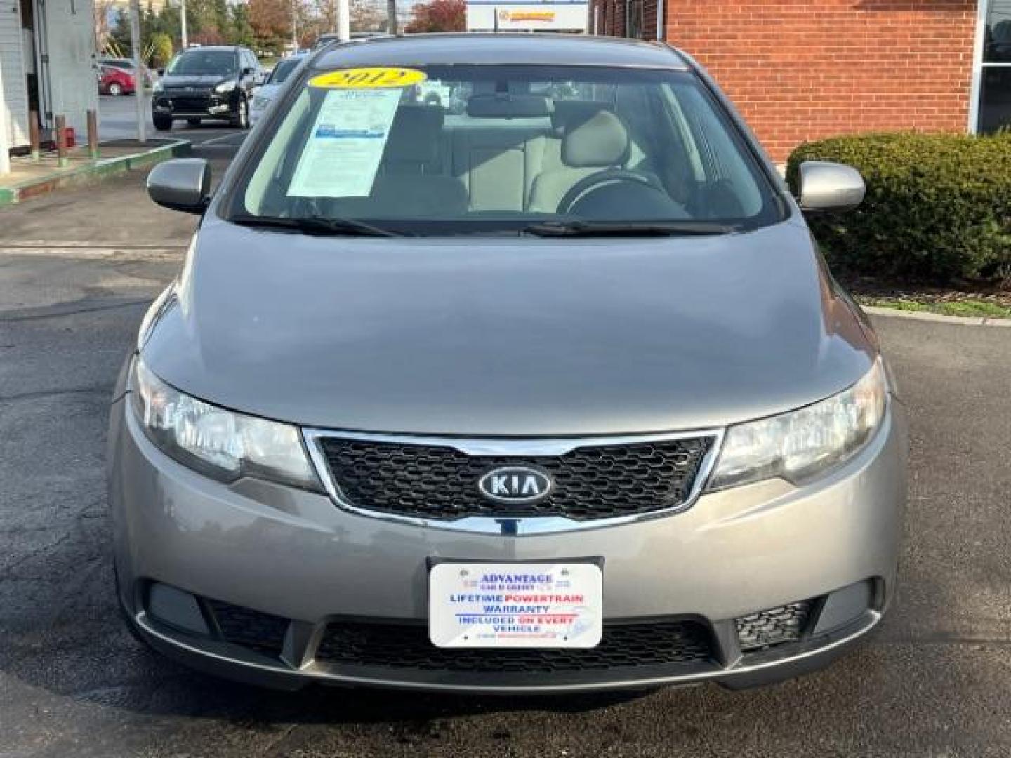 2012 Metal Bronze Metallic Kia Forte EX (KNAFU4A24C5) with an 2.0L L4 DOHC 16V engine, located at 1184 Kauffman Ave, Fairborn, OH, 45324, (937) 908-9800, 39.807365, -84.029114 - Photo#1