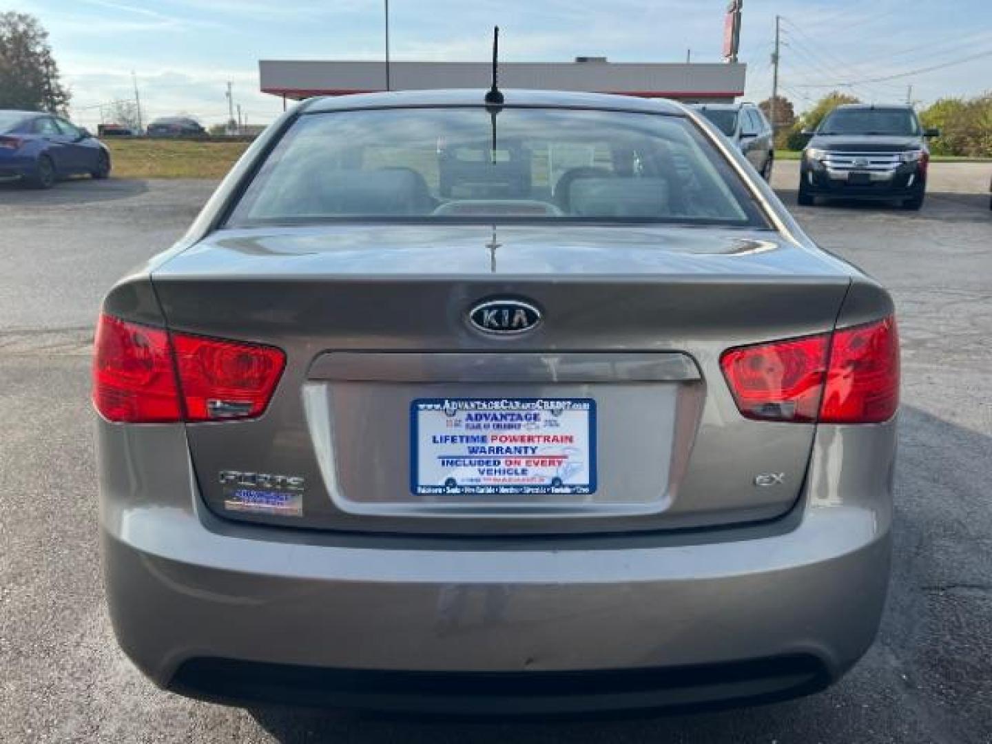 2012 Metal Bronze Metallic Kia Forte EX (KNAFU4A24C5) with an 2.0L L4 DOHC 16V engine, located at 1184 Kauffman Ave, Fairborn, OH, 45324, (937) 908-9800, 39.807365, -84.029114 - Photo#3