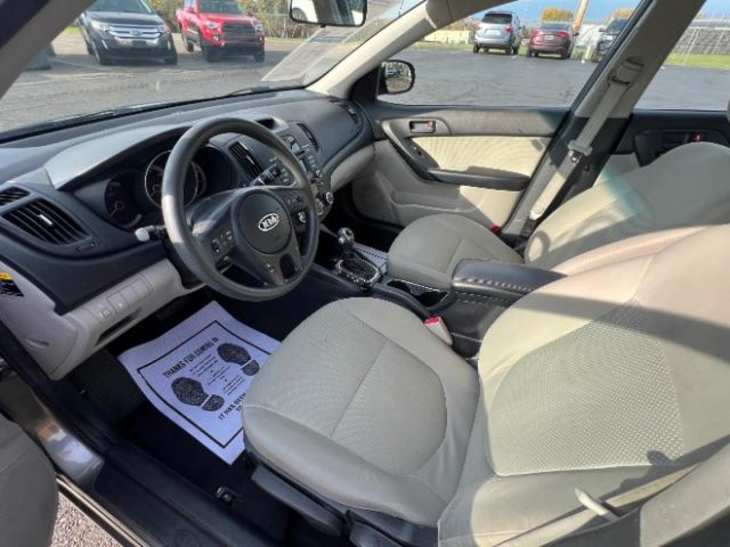 2012 Metal Bronze Metallic Kia Forte EX (KNAFU4A24C5) with an 2.0L L4 DOHC 16V engine, located at 1184 Kauffman Ave, Fairborn, OH, 45324, (937) 908-9800, 39.807365, -84.029114 - Photo#5