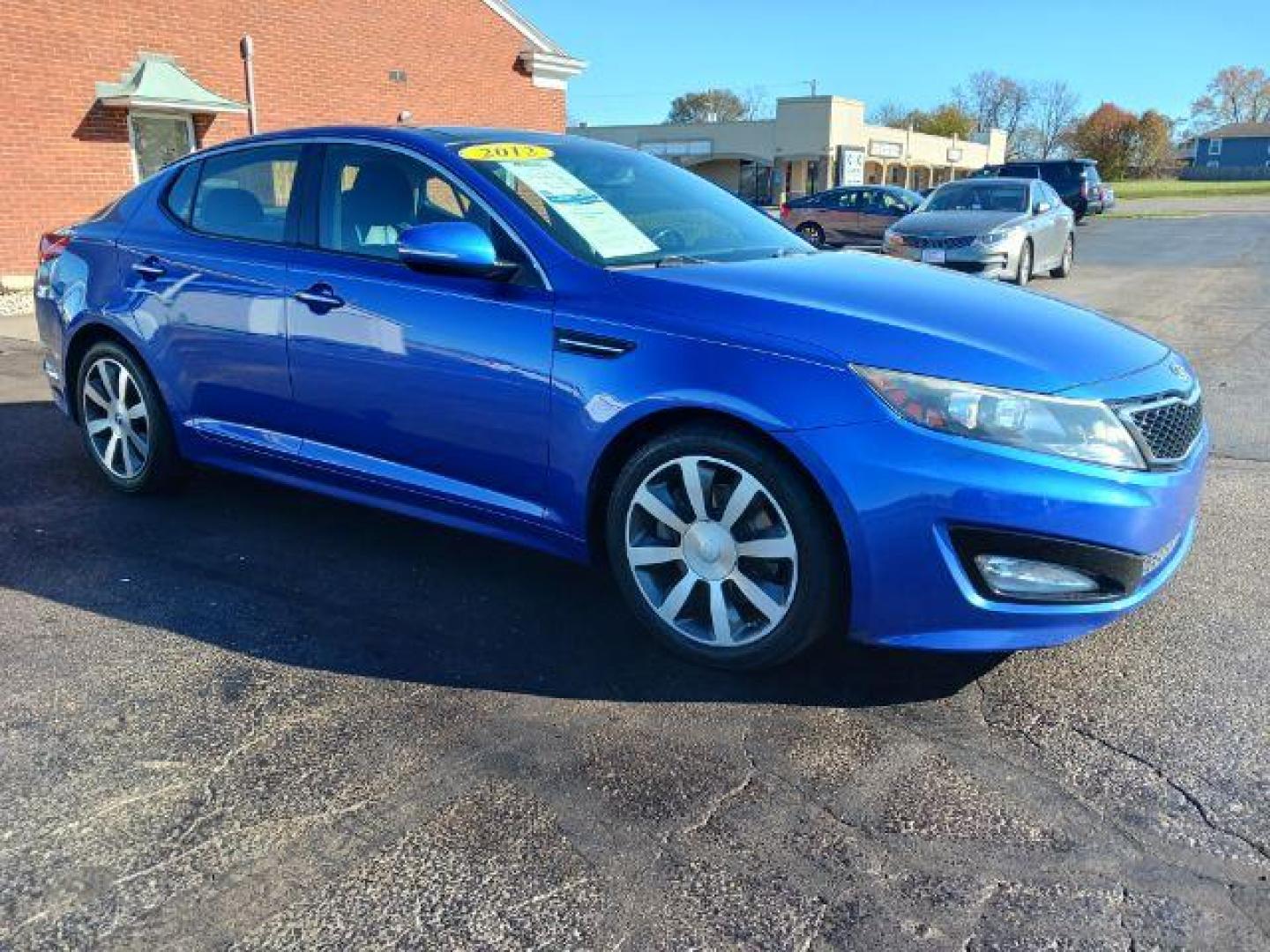 2012 Corsa Blue Pearl Metallic Kia Optima SX (5XXGR4A67CG) with an 2.0L L4 DOHC 16V TURBO engine, 6-Speed Automatic transmission, located at 1951 S Dayton Lakeview Rd., New Carlisle, OH, 45344, (937) 908-9800, 39.890999, -84.050255 - Photo#0