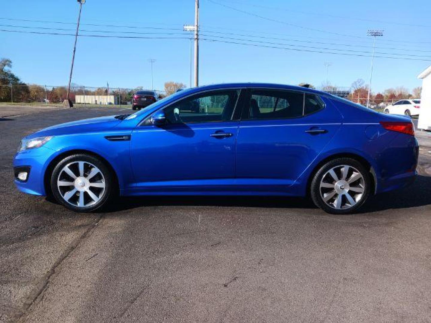 2012 Corsa Blue Pearl Metallic Kia Optima SX (5XXGR4A67CG) with an 2.0L L4 DOHC 16V TURBO engine, 6-Speed Automatic transmission, located at 1951 S Dayton Lakeview Rd., New Carlisle, OH, 45344, (937) 908-9800, 39.890999, -84.050255 - Photo#3