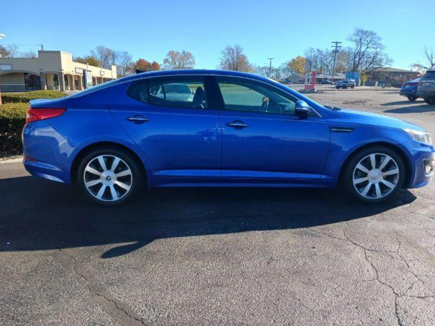 2012 Corsa Blue Pearl Metallic Kia Optima SX (5XXGR4A67CG) with an 2.0L L4 DOHC 16V TURBO engine, 6-Speed Automatic transmission, located at 1951 S Dayton Lakeview Rd., New Carlisle, OH, 45344, (937) 908-9800, 39.890999, -84.050255 - Photo#4