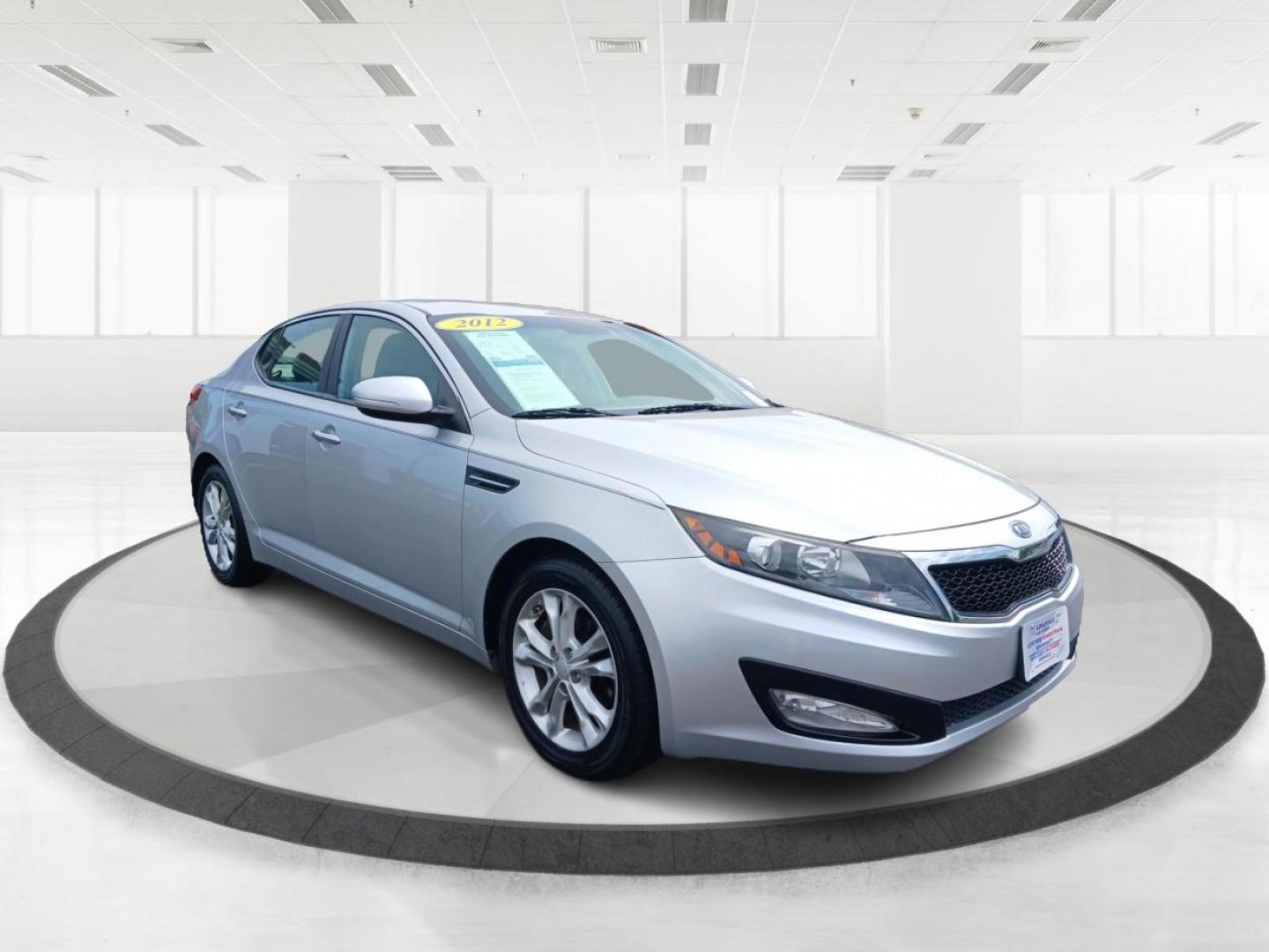 2012 Titanium Metallic Kia Optima EX (5XXGN4A7XCG) with an 2.4L L4 DOHC 16V engine, 6-Speed Automatic transmission, located at 880 E. National Road, Vandalia, OH, 45377, (937) 908-9800, 39.892189, -84.181015 - Photo#0