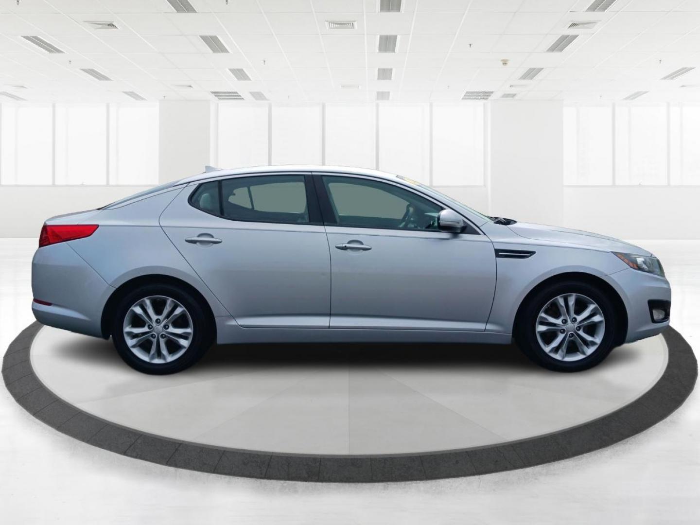 2012 Titanium Metallic Kia Optima EX (5XXGN4A7XCG) with an 2.4L L4 DOHC 16V engine, 6-Speed Automatic transmission, located at 880 E. National Road, Vandalia, OH, 45377, (937) 908-9800, 39.892189, -84.181015 - Photo#1