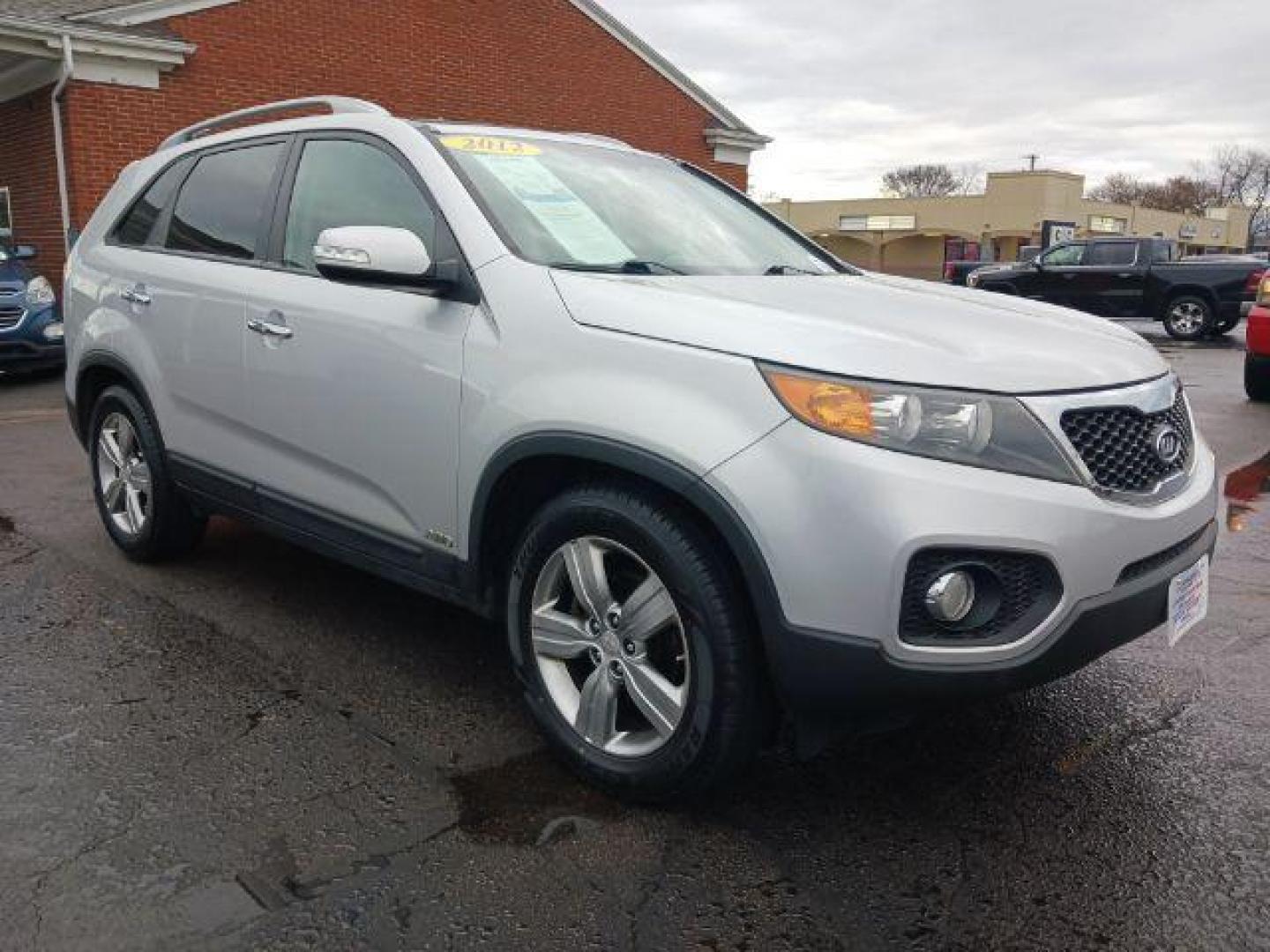 2012 Bright Silver Kia Sorento EX V6 4WD (5XYKUDA29CG) with an 3.5L V6 DOHC 24V engine, 6-Speed Automatic transmission, located at 4508 South Dixie Dr, Moraine, OH, 45439, (937) 908-9800, 39.690136, -84.216438 - Photo#0