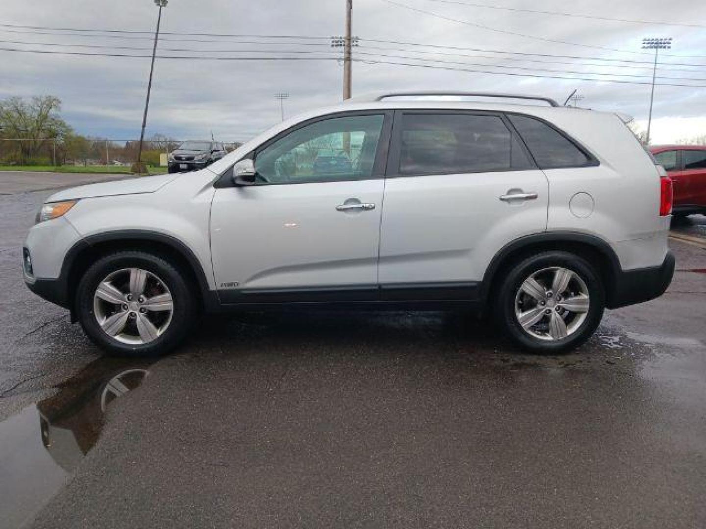 2012 Bright Silver Kia Sorento EX V6 4WD (5XYKUDA29CG) with an 3.5L V6 DOHC 24V engine, 6-Speed Automatic transmission, located at 4508 South Dixie Dr, Moraine, OH, 45439, (937) 908-9800, 39.690136, -84.216438 - Photo#3