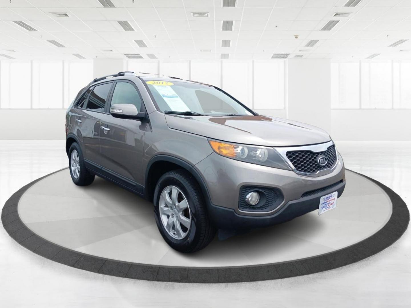 2012 Satin Metal Kia Sorento LX 2WD (5XYKT4A60CG) with an 2.4L L4 DOHC 16V engine, 6-Speed Automatic transmission, located at 401 Woodman Dr, Riverside, OH, 45431, (937) 908-9800, 39.763779, -84.122063 - Photo#0