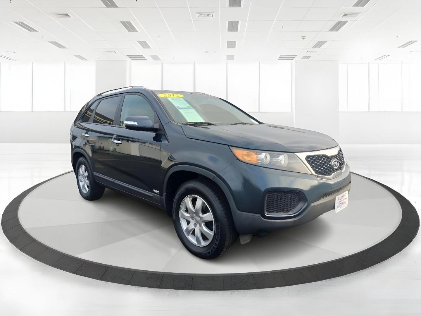 2012 Pacific Blue Kia Sorento LX 4WD (5XYKTDA2XCG) with an 3.5L V6 DOHC 24V engine, 6-Speed Automatic transmission, located at 1951 S Dayton Lakeview Rd., New Carlisle, OH, 45344, (937) 908-9800, 39.890999, -84.050255 - Photo#0