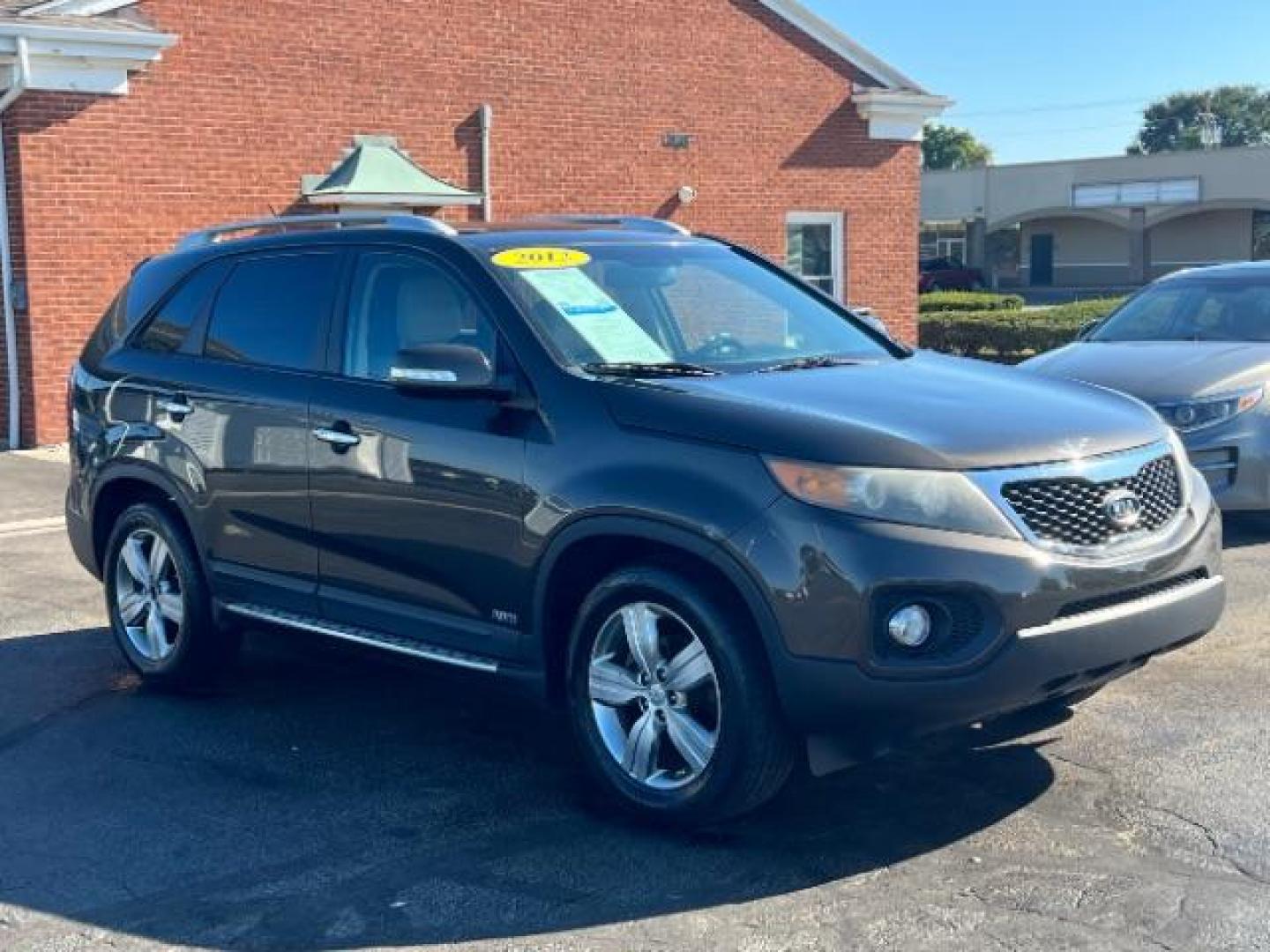 2012 Java Brown Kia Sorento EX 4WD (5XYKUDA68CG) with an 2.4L L4 DOHC 16V engine, 6-Speed Automatic transmission, located at 880 E. National Road, Vandalia, OH, 45377, (937) 908-9800, 39.892189, -84.181015 - Photo#0