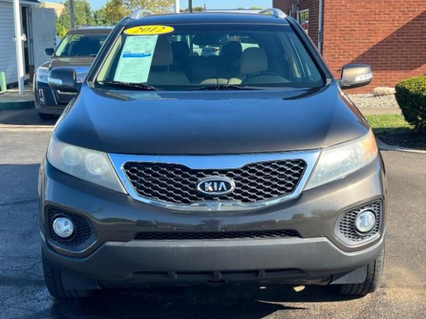 2012 Java Brown Kia Sorento EX 4WD (5XYKUDA68CG) with an 2.4L L4 DOHC 16V engine, 6-Speed Automatic transmission, located at 880 E. National Road, Vandalia, OH, 45377, (937) 908-9800, 39.892189, -84.181015 - Photo#1