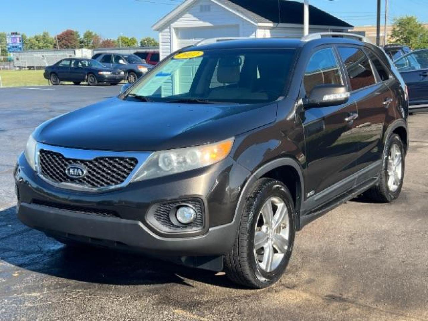 2012 Java Brown Kia Sorento EX 4WD (5XYKUDA68CG) with an 2.4L L4 DOHC 16V engine, 6-Speed Automatic transmission, located at 880 E. National Road, Vandalia, OH, 45377, (937) 908-9800, 39.892189, -84.181015 - Photo#2