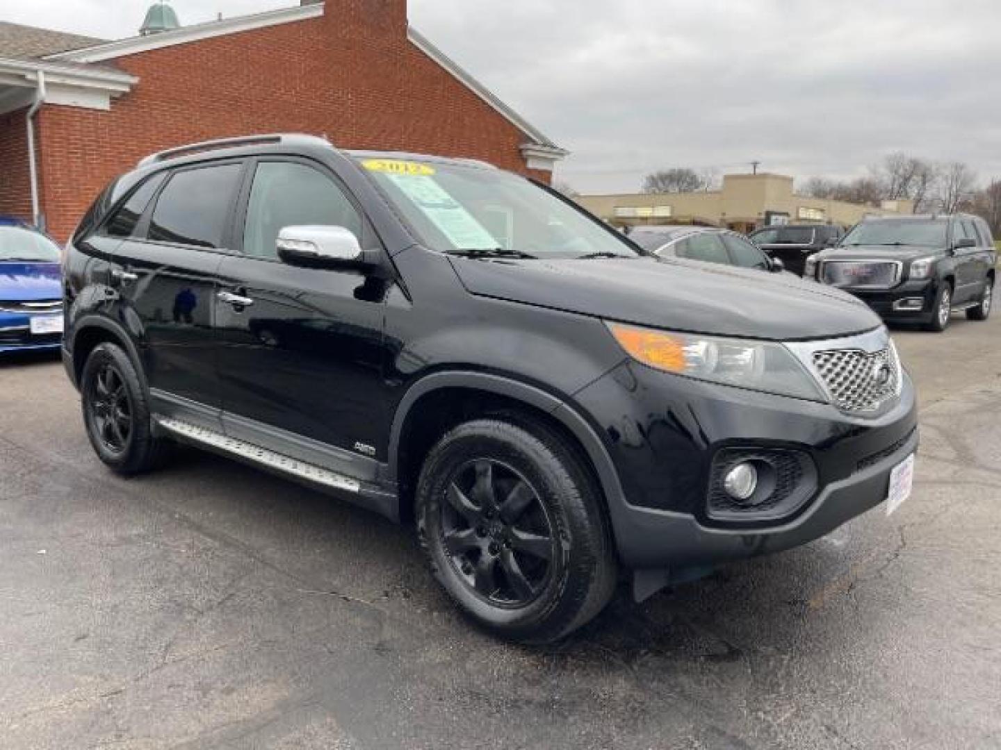 2012 Ebony Black Kia Sorento LX 4WD (5XYKTCA62CG) with an 2.4L L4 DOHC 16V engine, 6-Speed Automatic transmission, located at 4508 South Dixie Dr, Moraine, OH, 45439, (937) 908-9800, 39.690136, -84.216438 - Photo#0