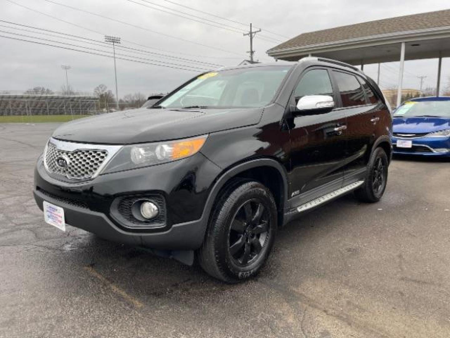 2012 Ebony Black Kia Sorento LX 4WD (5XYKTCA62CG) with an 2.4L L4 DOHC 16V engine, 6-Speed Automatic transmission, located at 4508 South Dixie Dr, Moraine, OH, 45439, (937) 908-9800, 39.690136, -84.216438 - Photo#1